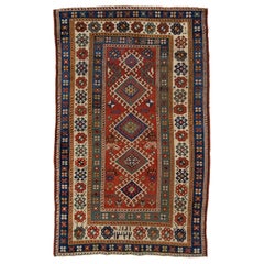 Tapis persan ancien Shirvan Rust en laine avec motif tribal