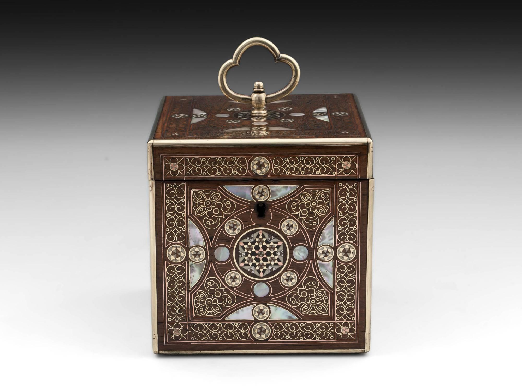 Single mahogany Persian tea caddy exquisitely inlaid with fine brass, copper wire and mother-of-pearl. 

The interior lid and base have glass protection. 

This fabulous eye-catching Persian tea caddy comes with a fully working lock and