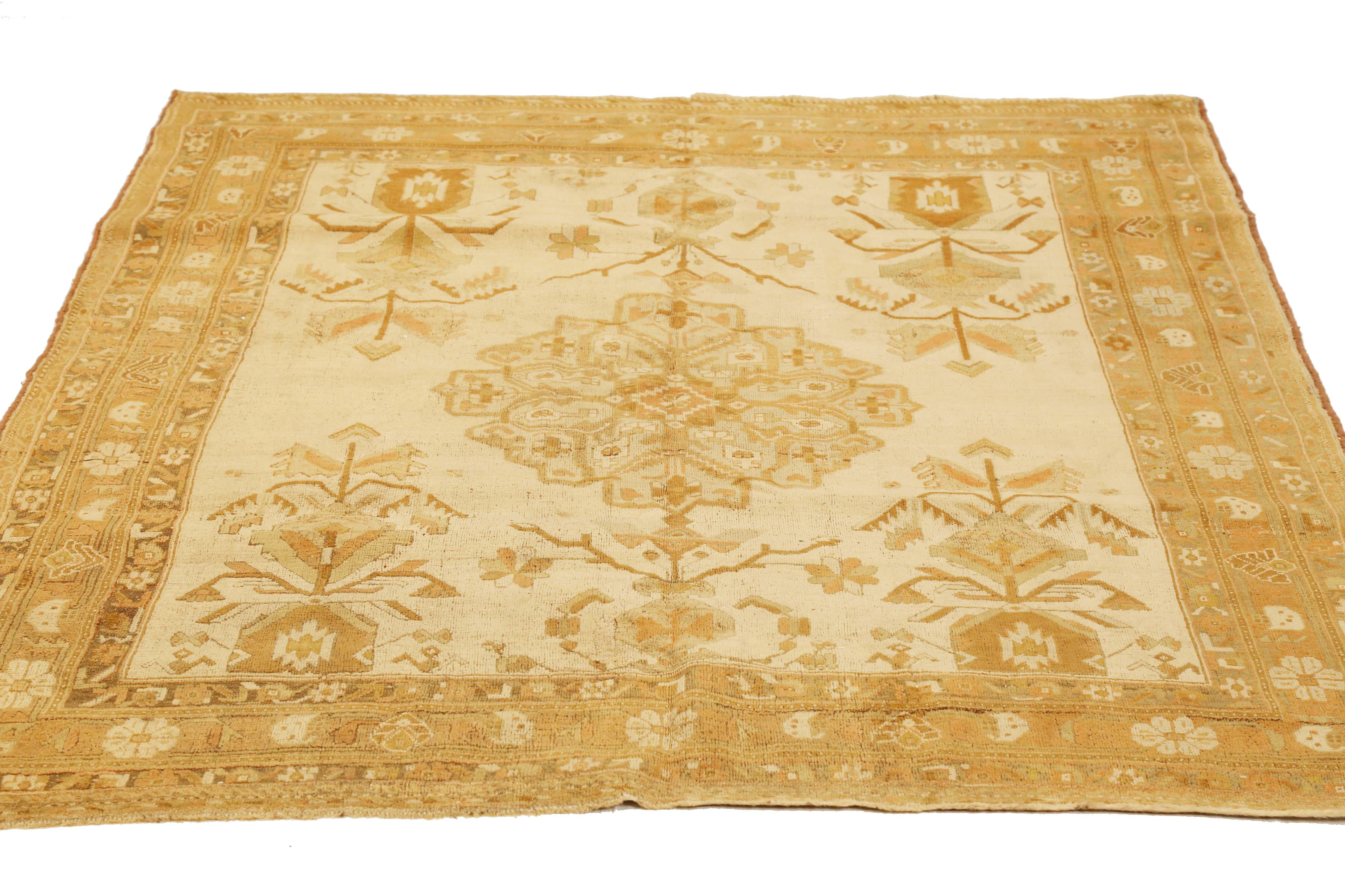 Antique Persian Sirjan rug handwoven from the finest sheep’s wool and colored with all-natural vegetable dyes that are safe for humans and pets. It’s a traditional Sirjan design featuring floral details in brown and beige over an ivory field. It’s