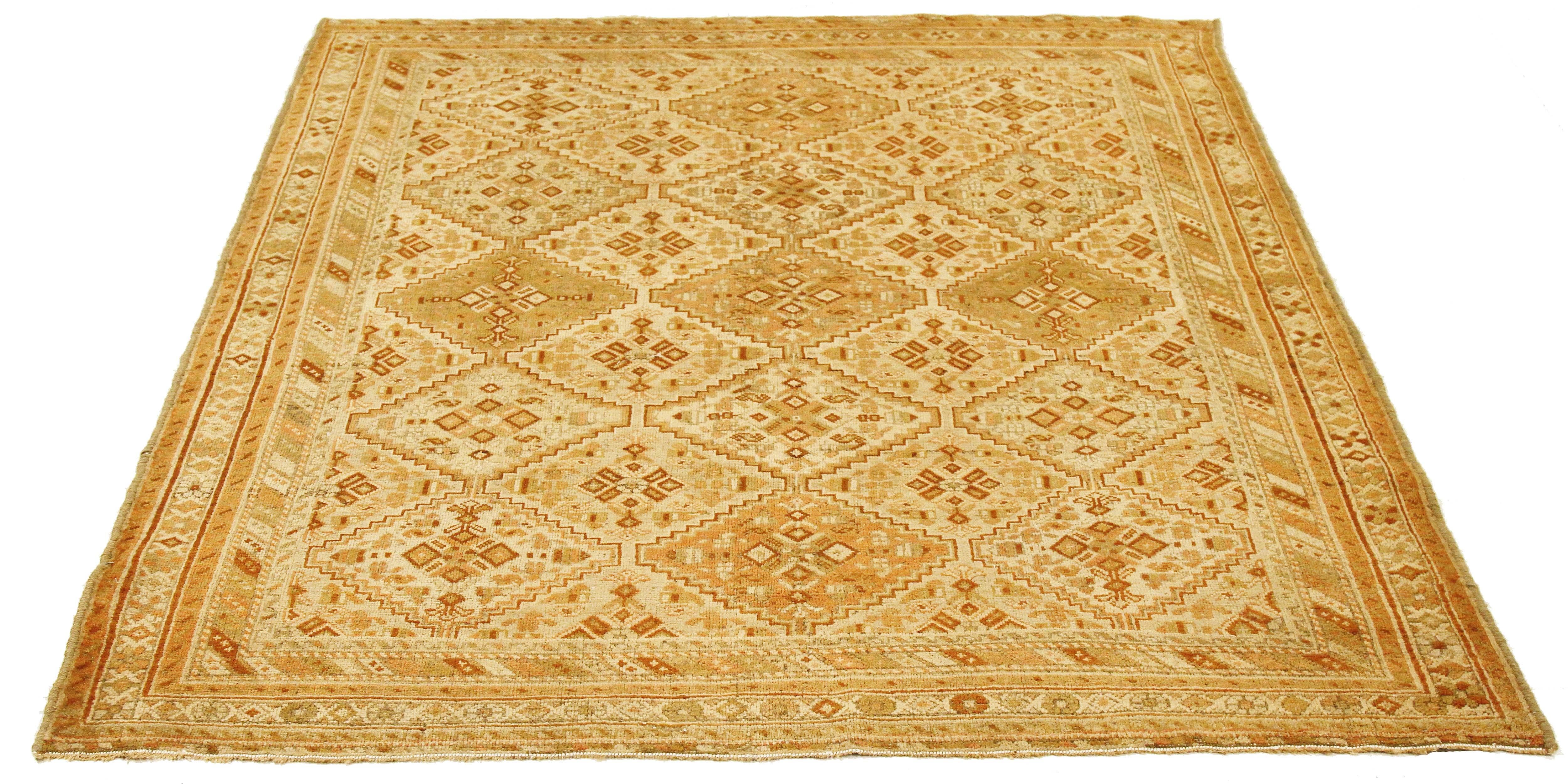 Antique Persian Sirjan rug handwoven from the finest sheep’s wool and colored with all-natural vegetable dyes that are safe for humans and pets. It’s a traditional Sirjan design featuring diamond medallion details over an ivory field. It’s an
