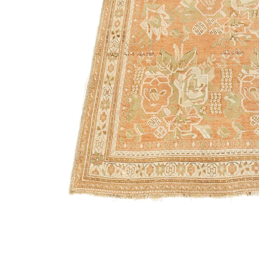 Hand-Woven Antique Persian Sirjan Rug with Green & Ivory Floral Patterns on Pink Field For Sale