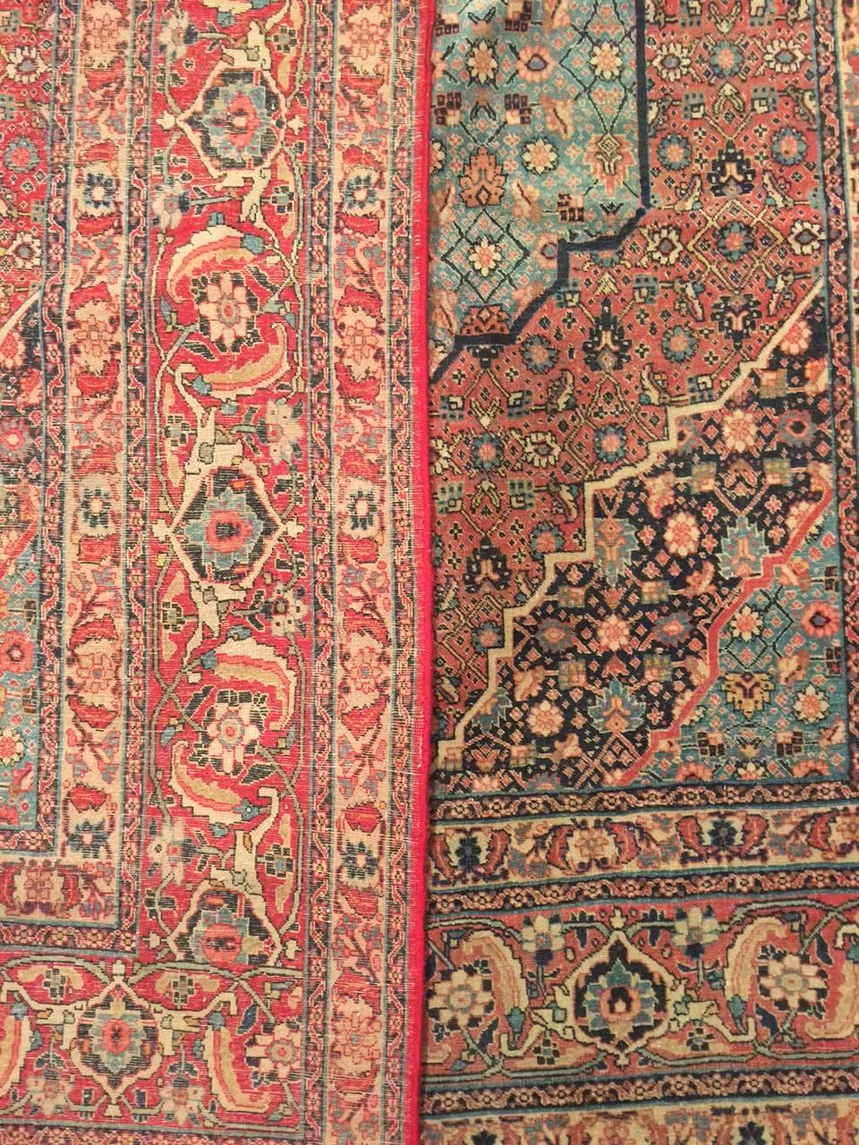 Antique Persian rust Tabriz rug, circa 1870. Tabriz is the capital of the north-western province of Azerbaijan in Northwest Persia and for centuries has enjoyed a great reputation as a centre of Oriental culture. Arguable the finest weaves or