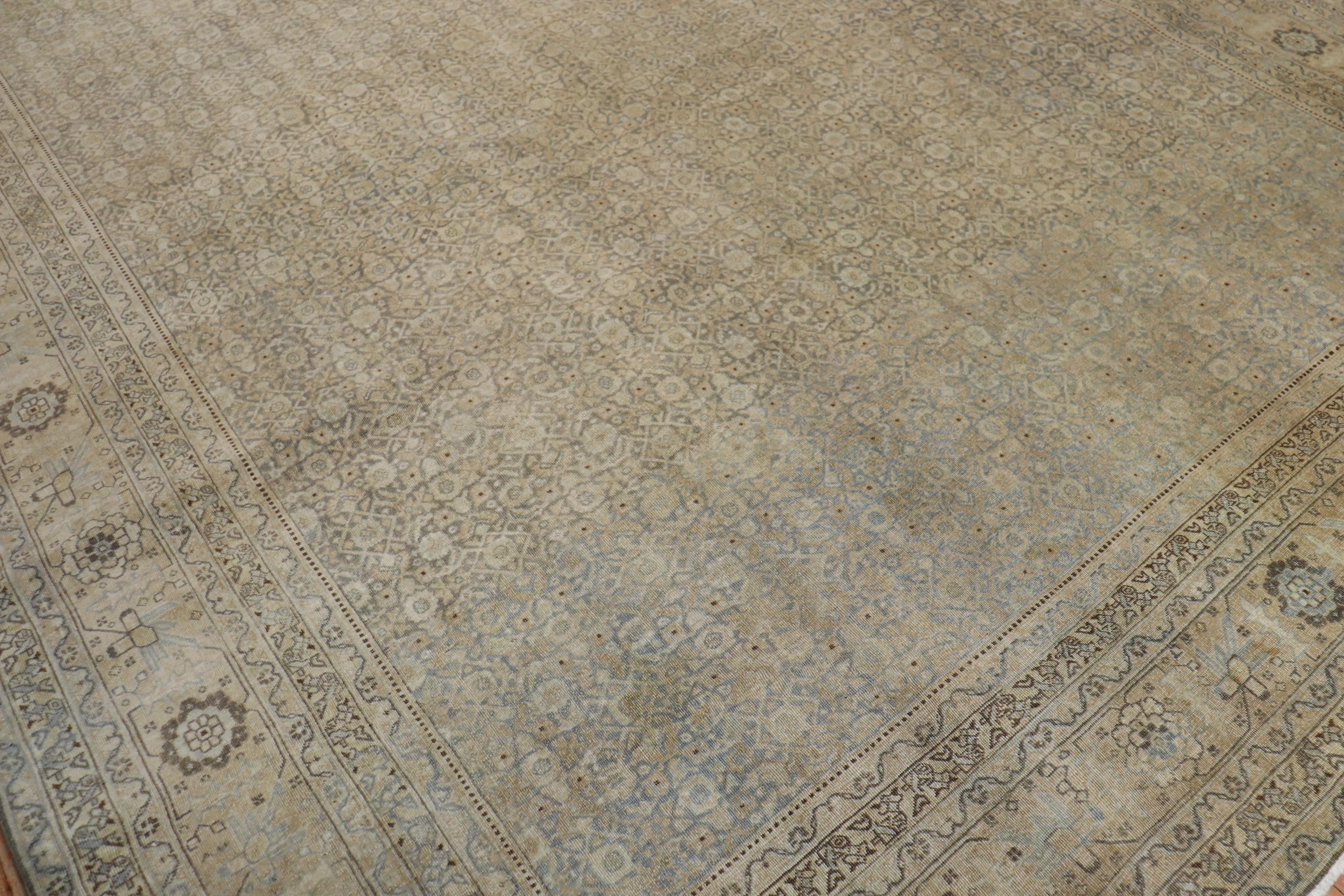 1st quarter of the 20th century room size Persian Tabriz rug in predominantly slate grey.

Measures: 9.6'' x 13.1''.