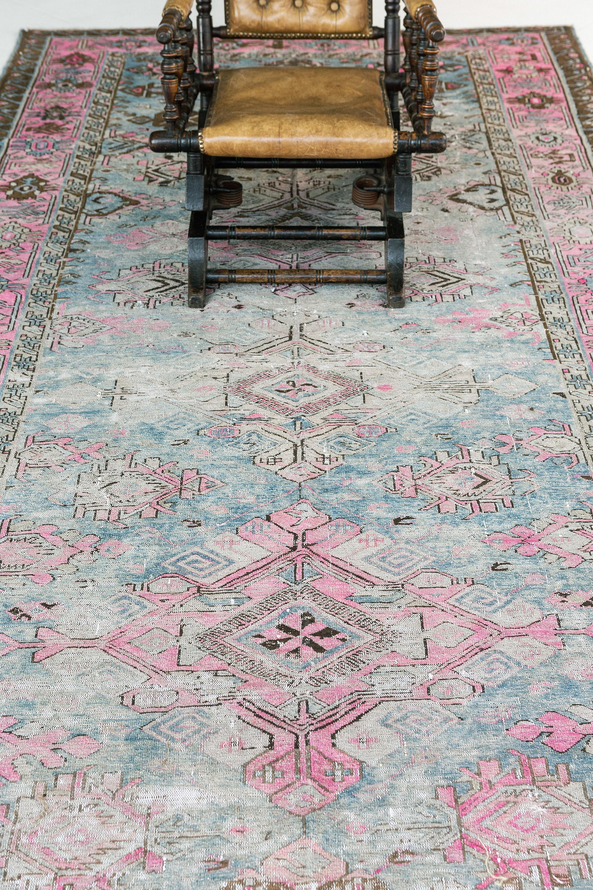 No doubt about it, the lovely pink color in this rug makes it an absolute stand-out. The magnificent color scheme from pink to blues makes it a magnificent addition to your room. The spectacular pink border with tribal designs is a beauty.