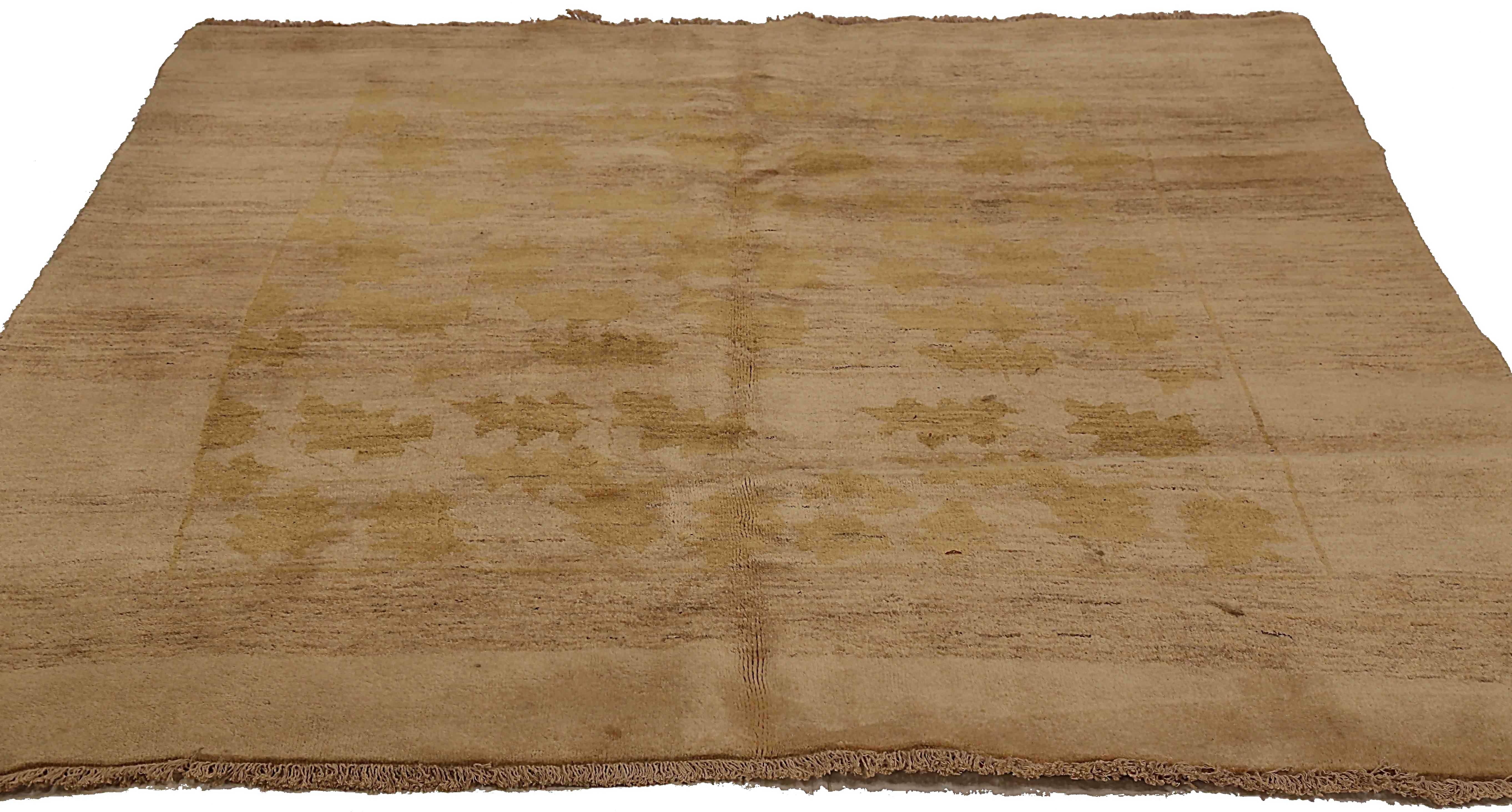 Antique Persian square rug handwoven from the finest sheep’s wool. It’s colored with all-natural vegetable dyes that are safe for humans and pets. It’s a traditional Gabbeh design handwoven by expert artisans. It’s a lovely square rug that can be