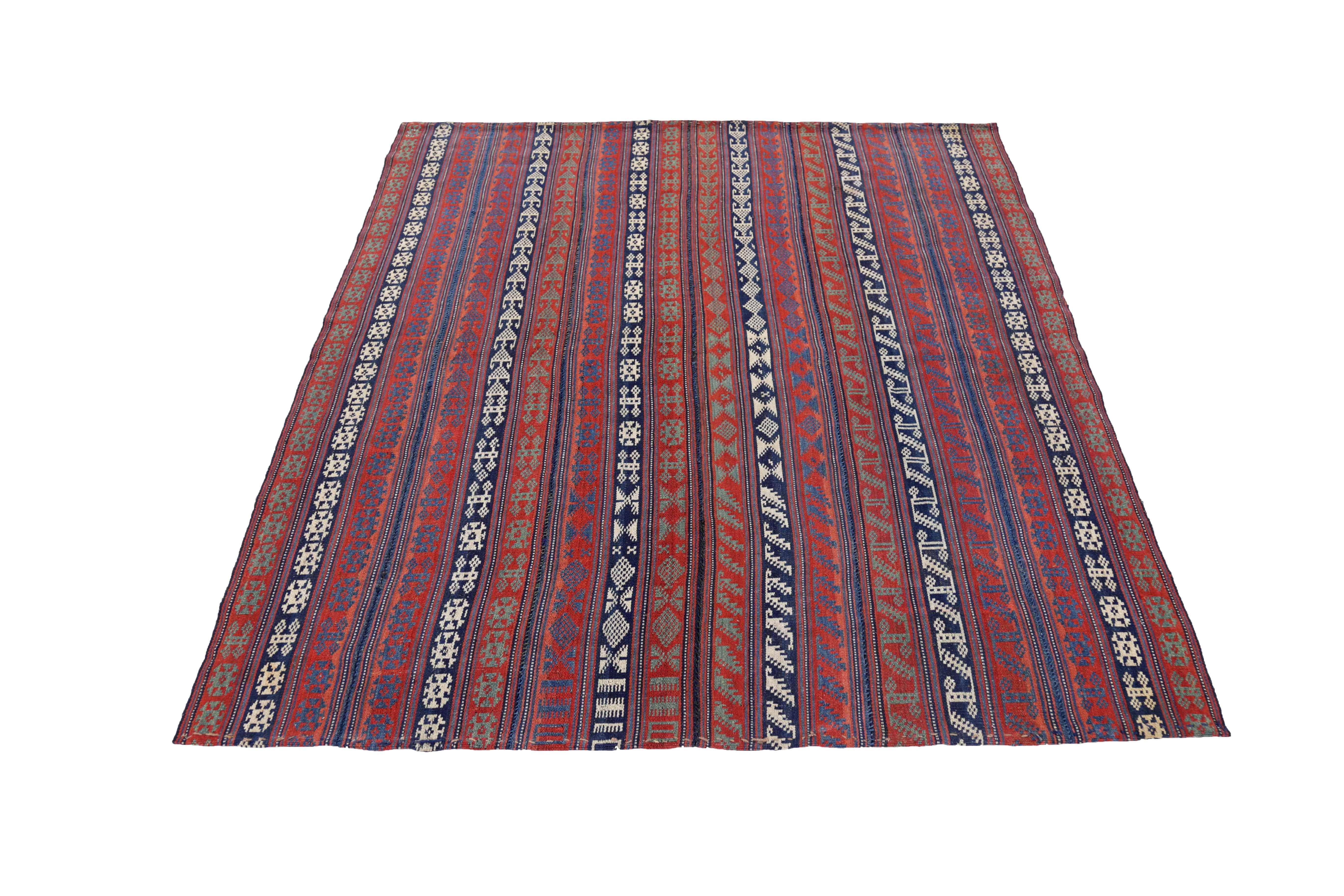 Antique Persian square rug handwoven from the finest sheep’s wool. It’s colored with all-natural vegetable dyes that are safe for humans and pets. It’s a traditional Jajm design handwoven by expert artisans. It’s a lovely square rug that can be