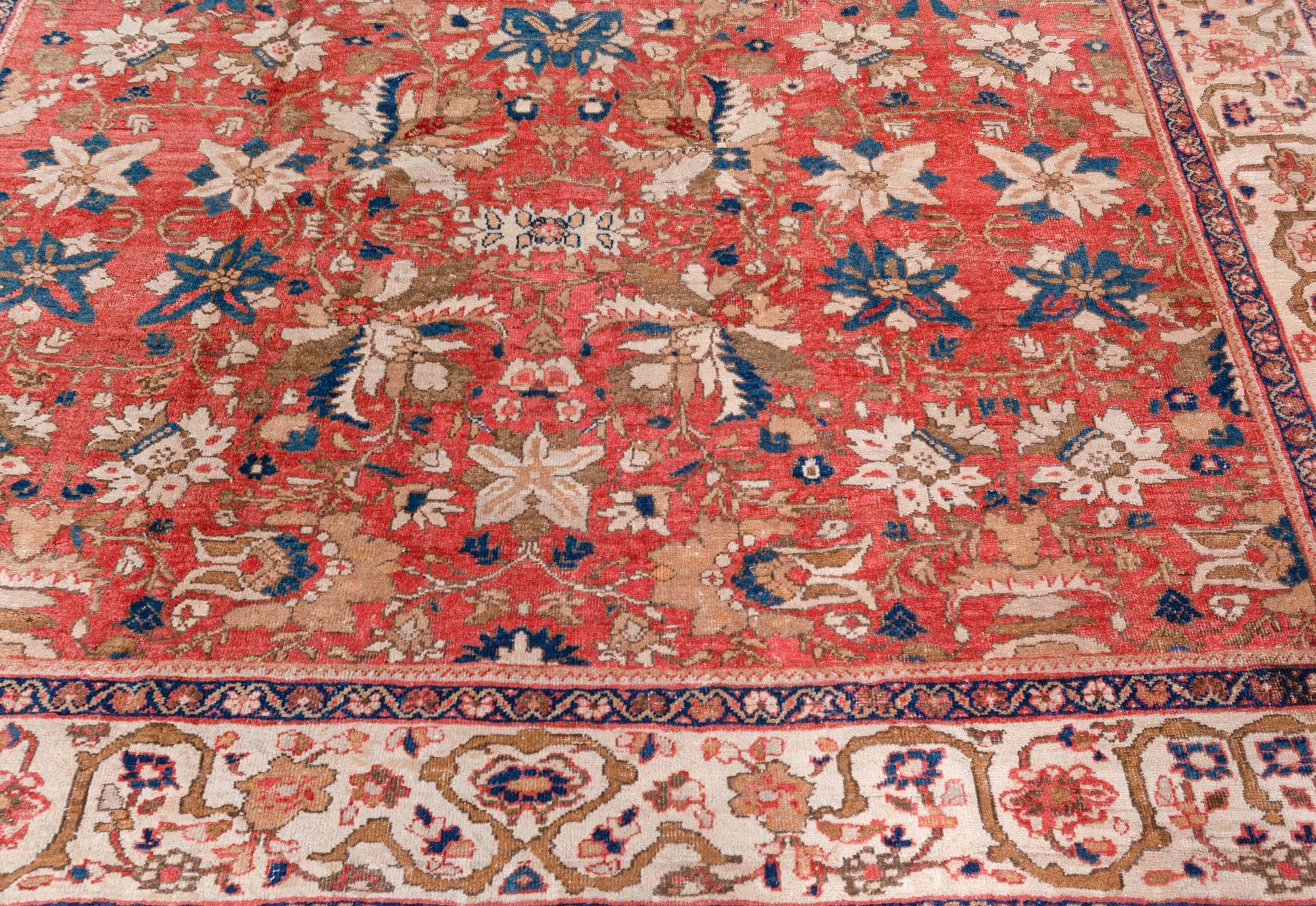 20th Century Antique Persian Sultanabad Floral Red Background Handmade Wool Rug For Sale