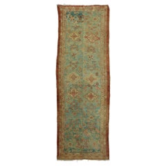 Antique Persian Sultanabad Fragment Runner with Floral Medallions