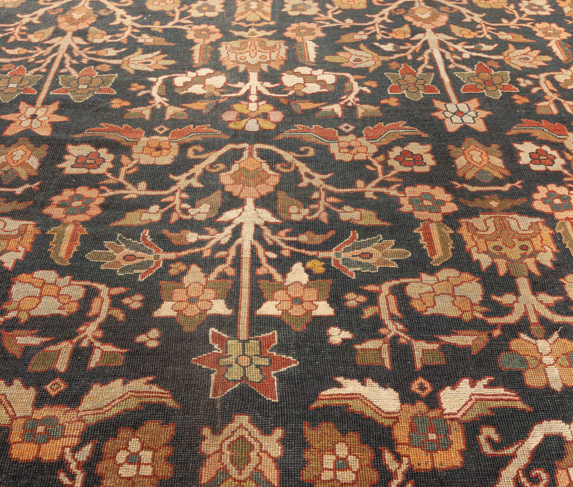 Antique Persian Sultanabad botanic handmade wool rug
Size: 13'0