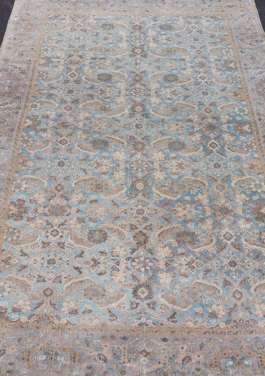Antique Persian Sultanabad In Floral All-Over Design in Light Blue With Tan. Country of Origin: Iran; Type: Mahal; Design: All-Over, Medallion, floral motifs; Keivan Woven Arts: rug EMB-22171-15053; Mahal Rug.
Measures: 5'0 x 8'2 
This antique