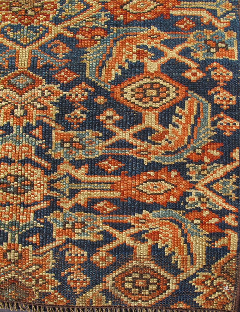 Antique Persian Sultanabad rug in blue background in multi-colors. Keivan Woven Arts/ Rug 10-KE-1012, country of origin / type: Iran / Sultanabad, circa 1890.

Measures: 2'3 x 2'5.
This antique Sultanabad-Mahal rug features coloration influenced by