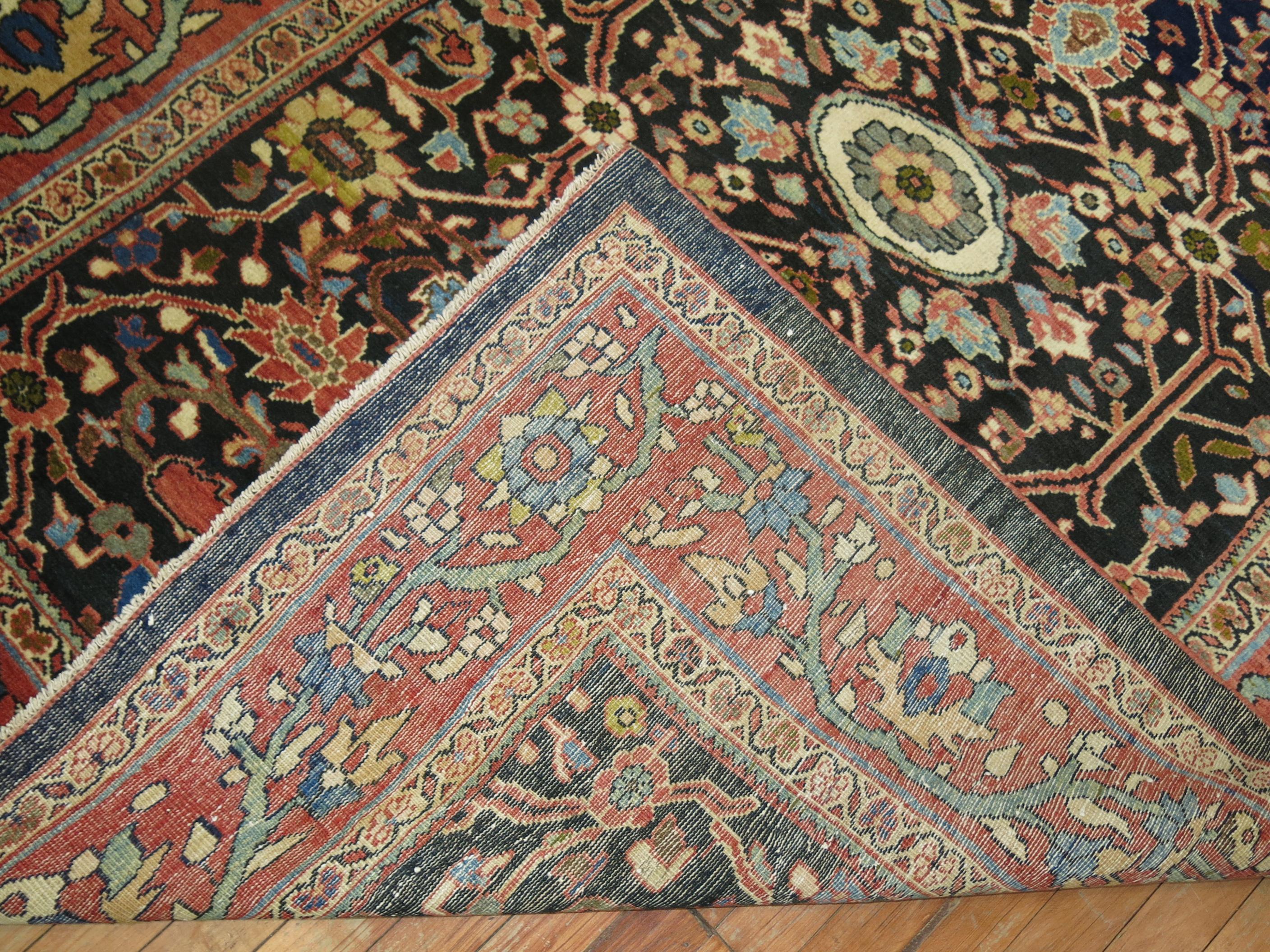 A connoisseur caliber rare size early 20th century Persian mahal Sultanabad carpet.

Woven in a series of villages in Western Central Iran, Sultanabad carpets employ over-scale, spacious all-over patterns that are highly prized for their