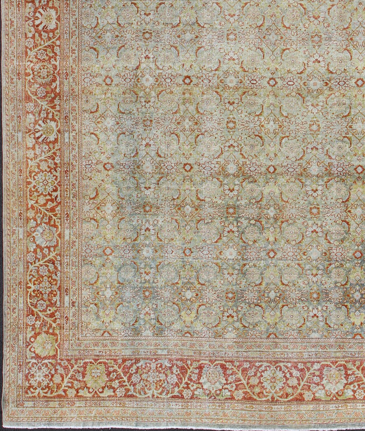 This antique Persian Mahal relies heavily on exquisite details, as well as an intricate Herati pattern.  Rug/GLC-129A.

Measures: 12'5 x 15'4

Fine trellis of beautifully colored large and small flowers sprawls across the light green field,