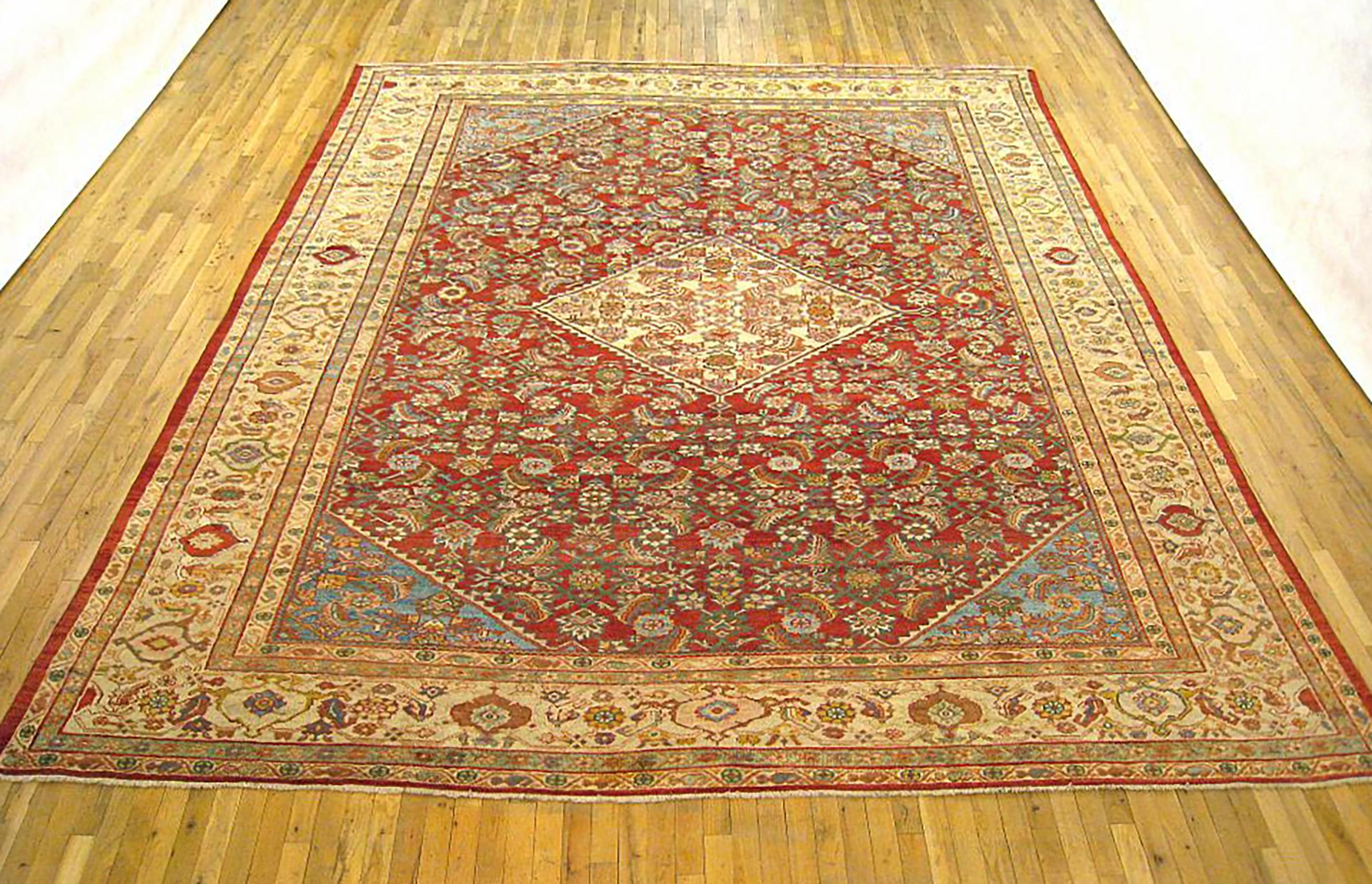 Antique Persian Sultanabad Rug, Room size, circa 1910

A one-of-a-kind antique Persian Sultanabad oriental carpet with a thick and lustrous wool pile, knotted by hand, with soft touch and great resistance to wear. This carpet features a central