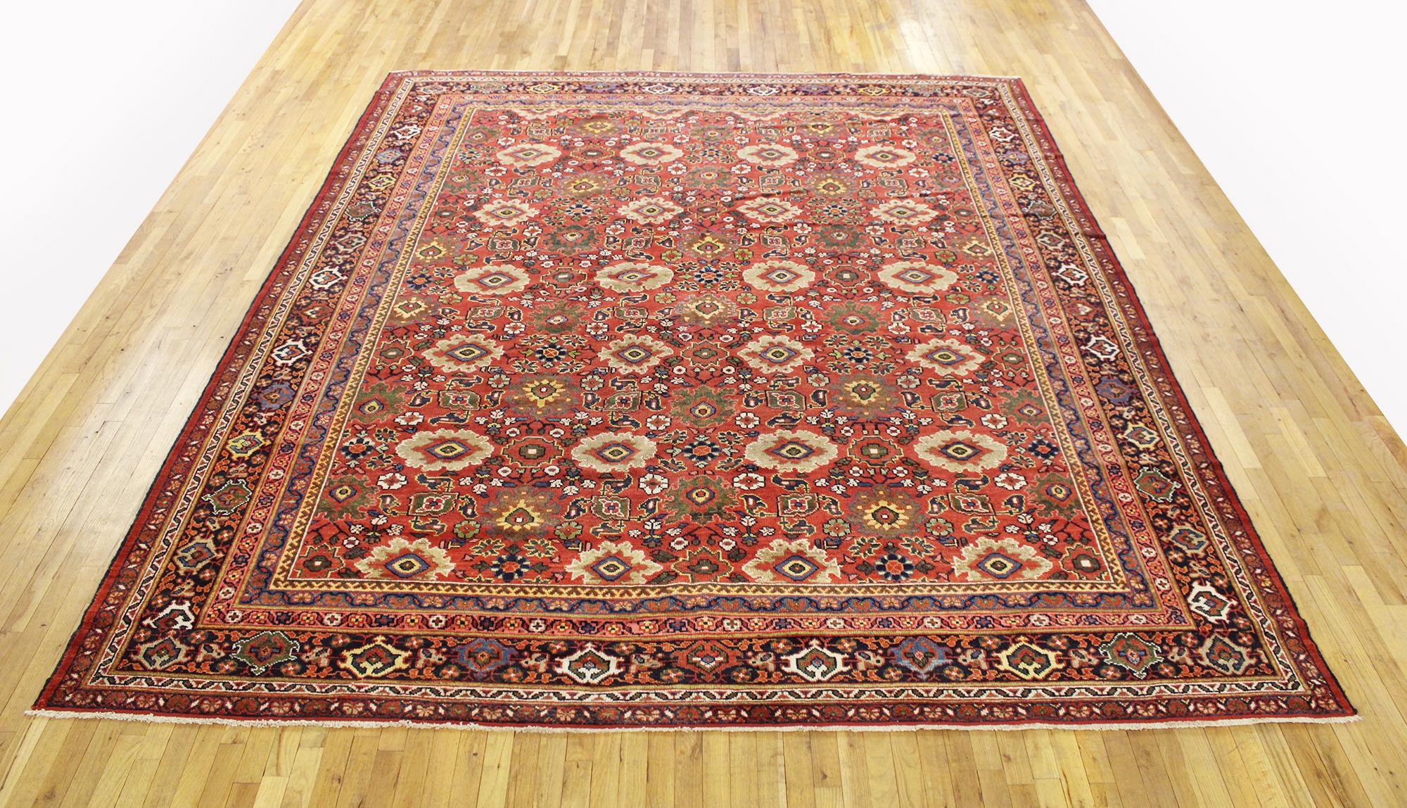 Antique Persian Sultanabad rug, room size, circa 1910

A one-of-a-kind antique Persian Sultanabad oriental carpet with a thick and lustrous wool pile, knotted by hand, with soft touch and great resistance to wear. This carpet features floral
