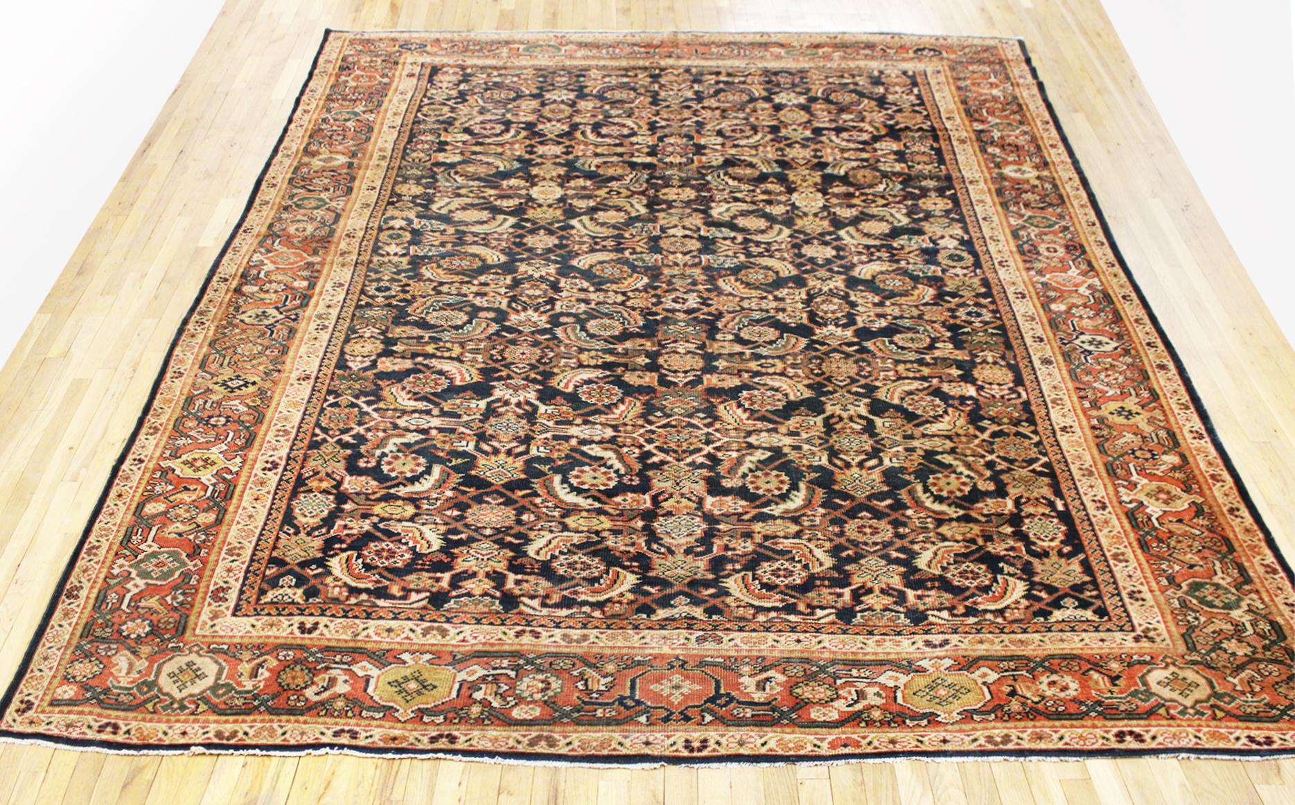Antique Persian Sultanabad rug, Room size, circa 1910

A one-of-a-kind antique Persian Sultanabad oriental carpet with a thick and lustrous wool pile, knotted by hand, with soft touch and great resistance to wear. This carpet features an Herati