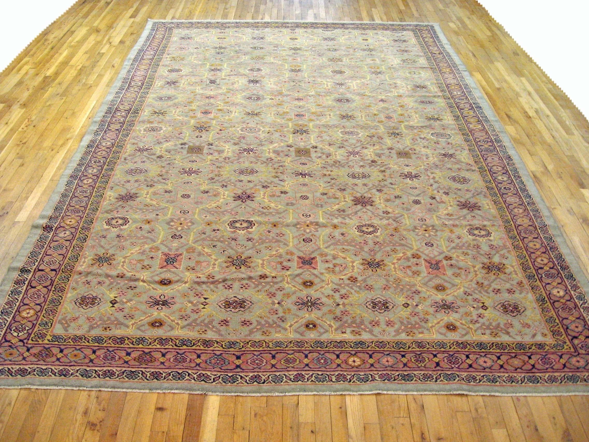 Antique Persian Sultanabad Rug, Roomlery size, circa 1910

A one-of-a-kind antique Persian Sultanabad oriental carpet with a thick and lustrous wool pile, knotted by hand, with soft touch and great resistance to wear. This carpet features a