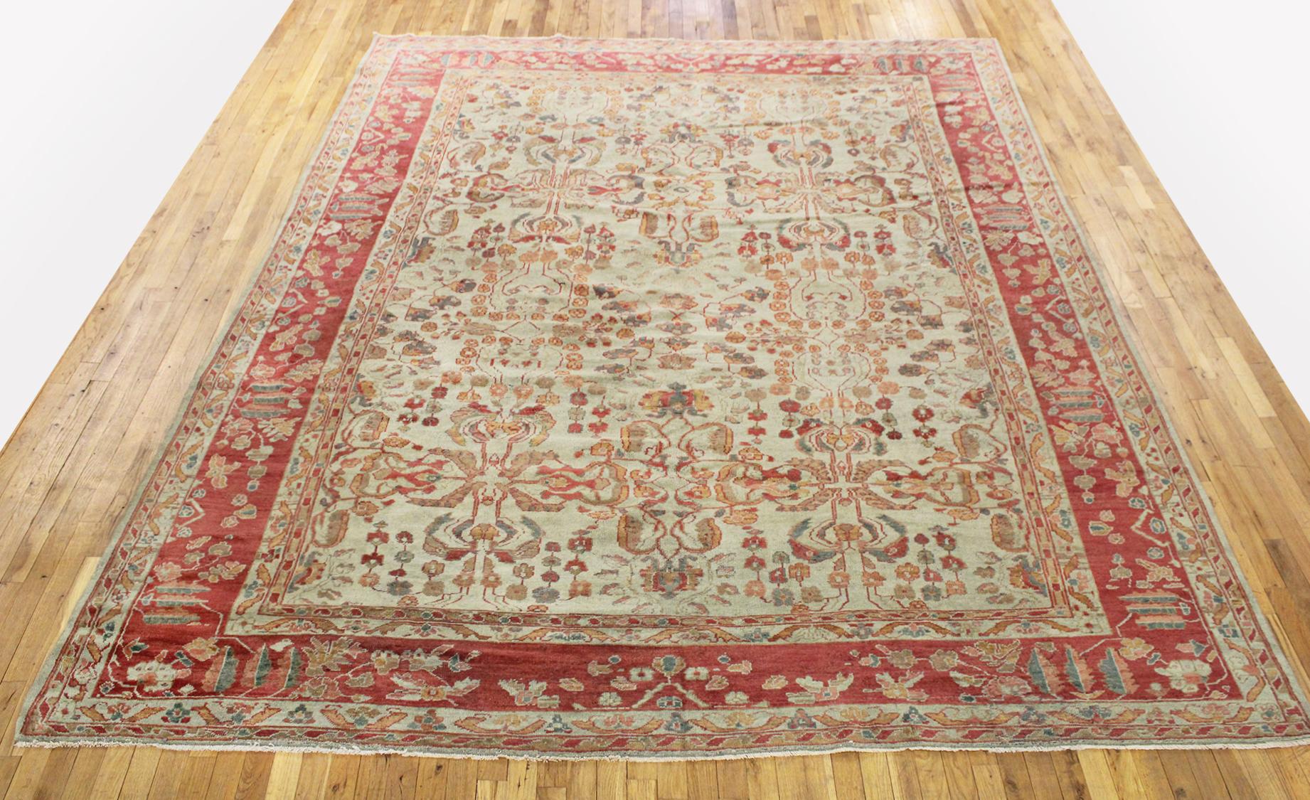 Antique Persian Sultanabad Rug, Room size, circa 1900

A one-of-a-kind antique Persian Sultanabad oriental carpet with a thick and lustrous wool pile, knotted by hand, with soft touch and great resistance to wear. This carpet features a symmetrical