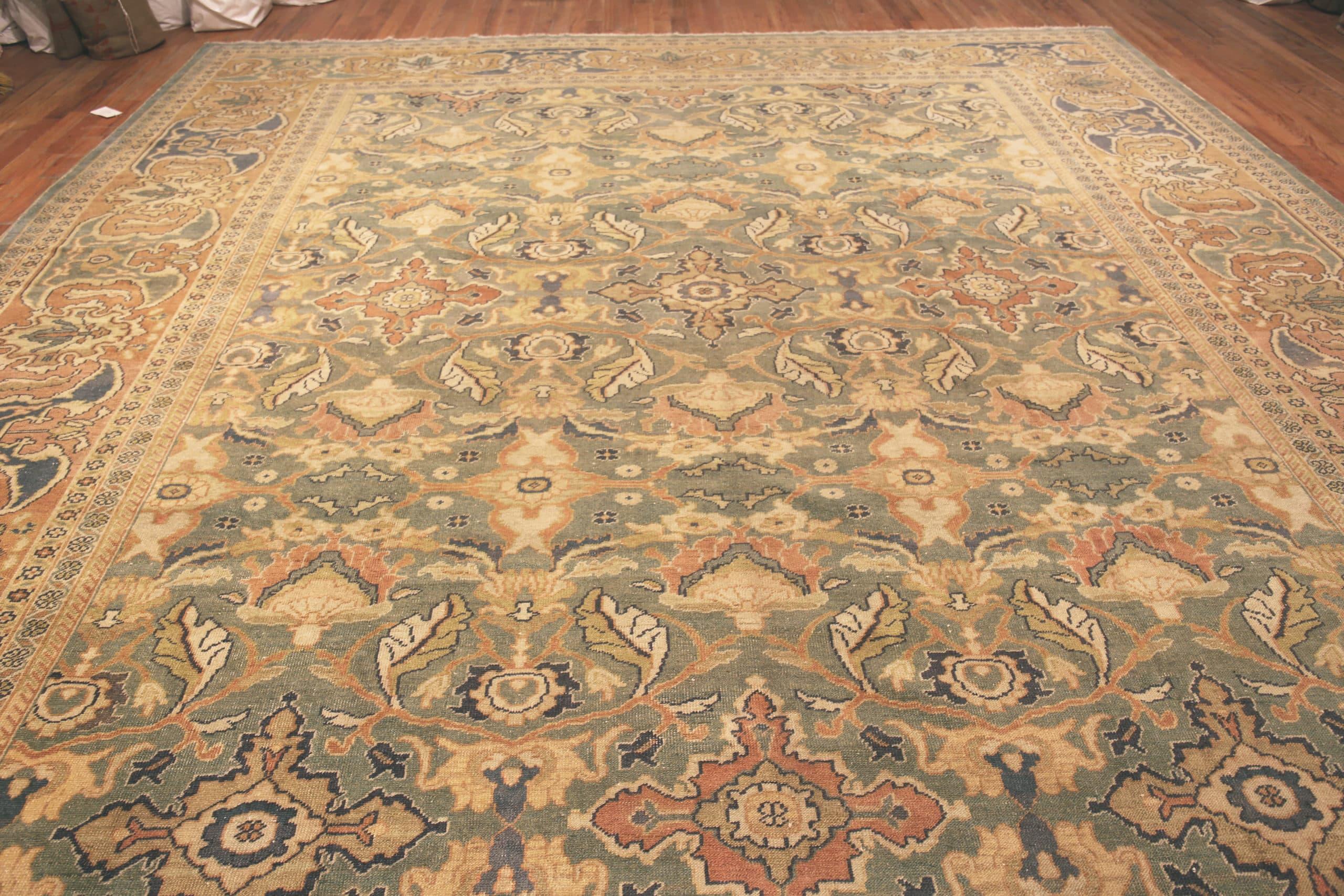 Beautiful Decorative Soft Green Large Size Rustic Antique Persian Sultanabad Rug, Country of Origin: Persia, Circa Date: 1920. Size: 14 ft 6 in x 18 ft 9 in (4.42 m x 5.71 m)

