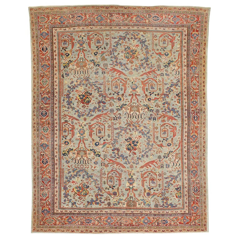 Antique Persian Sultanabad Rug with Blue and Red Botanical Motifs For ...