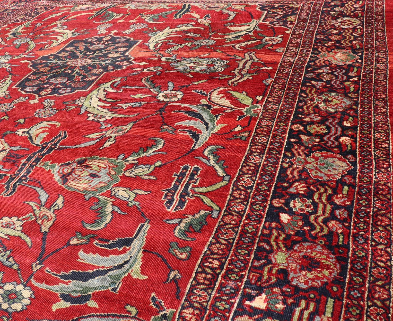 Antique Persian Zeigler Sultanabad Rug with Botanical Elements Set on Red Field For Sale 9