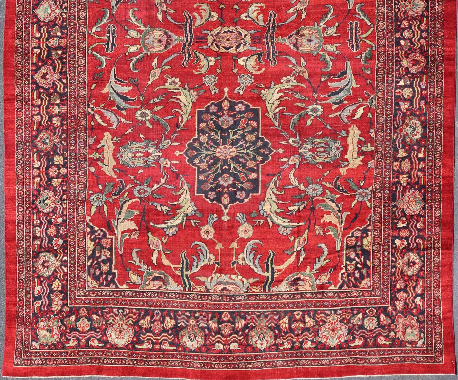 Antique Persian Zeigler Sultanabad Rug with Botanical Elements Set on Red Field In Good Condition For Sale In Atlanta, GA