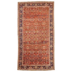 Antique Persian Sultanabad Rug with Green and Ivory Floral Motif on Red Field