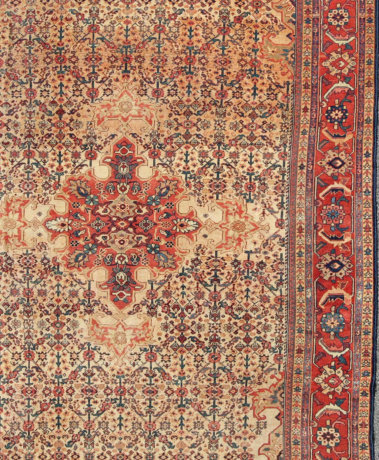   Antique Persian Sultanabad with Medallion in Yellow Cream, Blue Red and Green

Measures: 8'10” x 12'4”

Antique Persian Sultanabad Rug, Keivan Woven Arts: rug/ G-0405; Country of Origin: Iran; Type: Sultanabad; Design: Floral, Medallion.

This