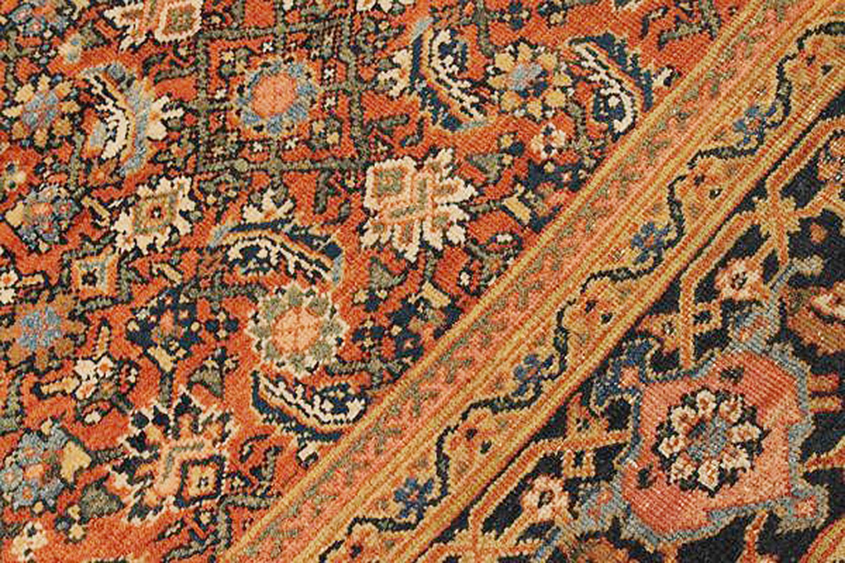 Antique Persian Sultanabad Rug with Navy and Green Floral Motifs on Orange Field In Excellent Condition For Sale In Dallas, TX