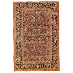 Antique Persian Sultanabad Rug with Navy and Green Floral Motifs on Orange Field