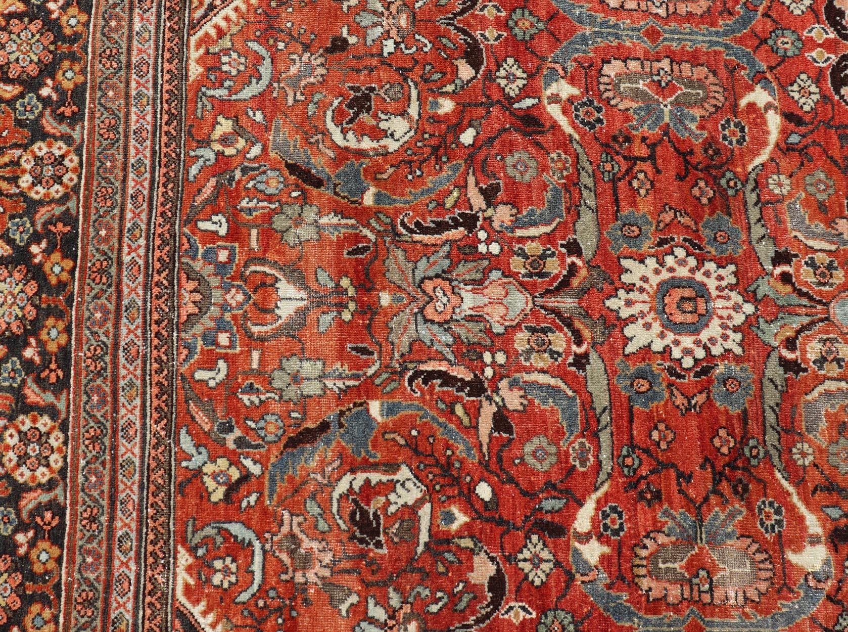 Measures: 10'3 x 13'6 

Antique Persian Sultanabad Rug with Red Ground and Allover Design 10'3 x 13'6. Keivan Woven Arts/ rug/A24-0905-213, country of origin / type: Iran / Sultanabad, circa 1920.

An exceptional antique Persian Sultanabad rug
