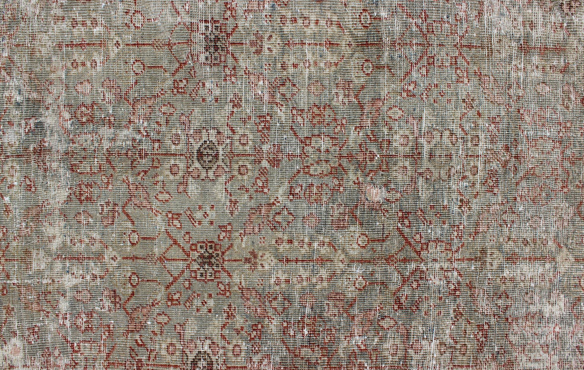 Early 20th Century Antique Persian Distressed Sultanabad Rug with Subdued All-Over Design in Green