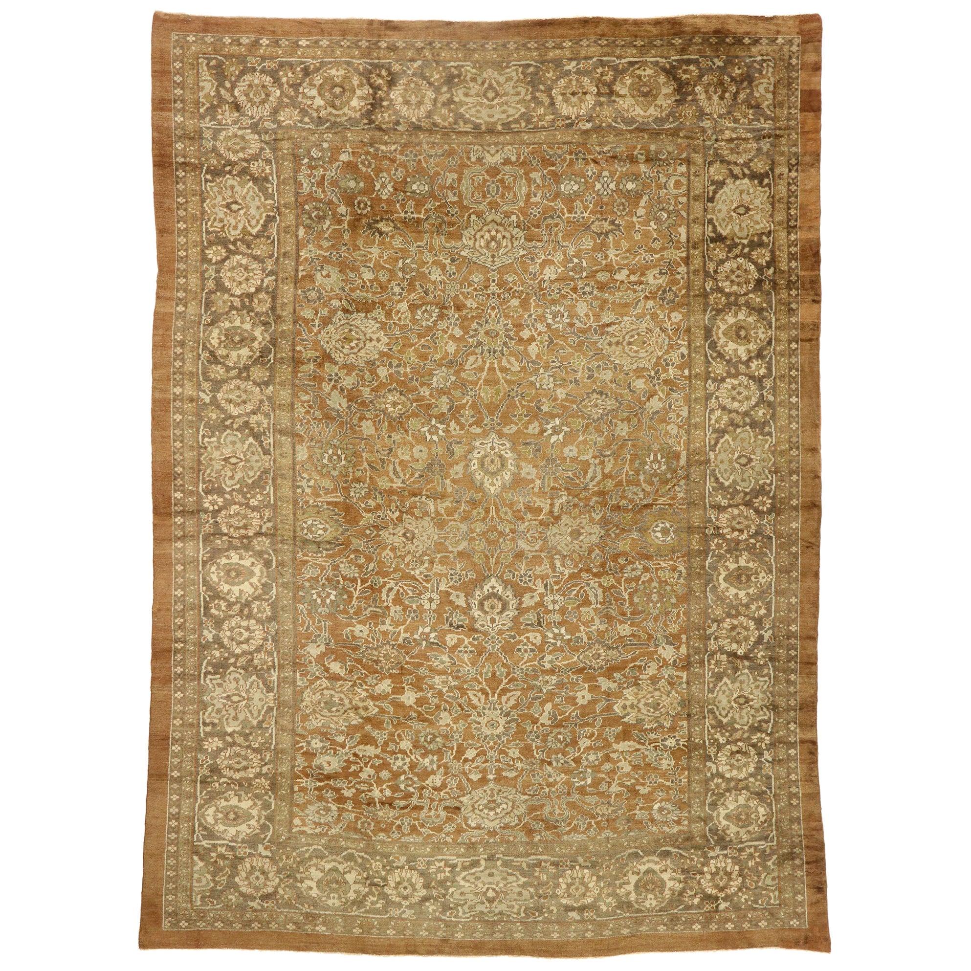 73681, antique Persian Sultanabad rug with warm Arts & Crafts style. With its timeless design and warm earth-tone colors, this hand knotted wool antique Persian Sultanabad rug astounds with its beauty. It features an all-over botanical lattice