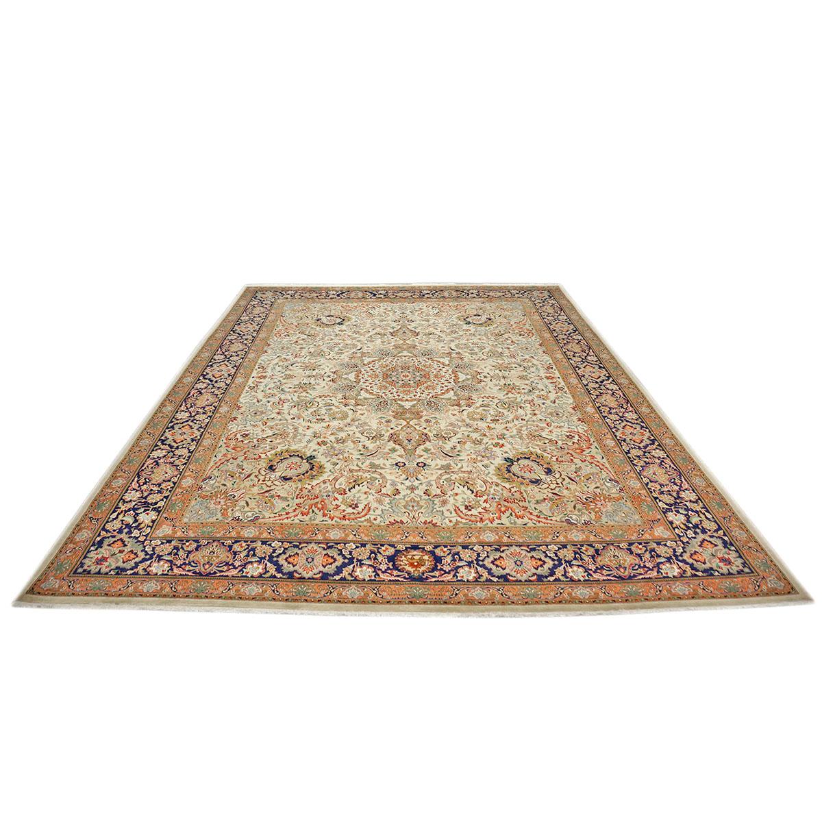 Ashly Fine Rugs presents a 1930s Antique Persian Tabriz. Tabriz is a northern city in modern-day Iran and has forever been famous for the fineness and craftsmanship of its handmade rugs. This piece has an ivory-colored background with design,