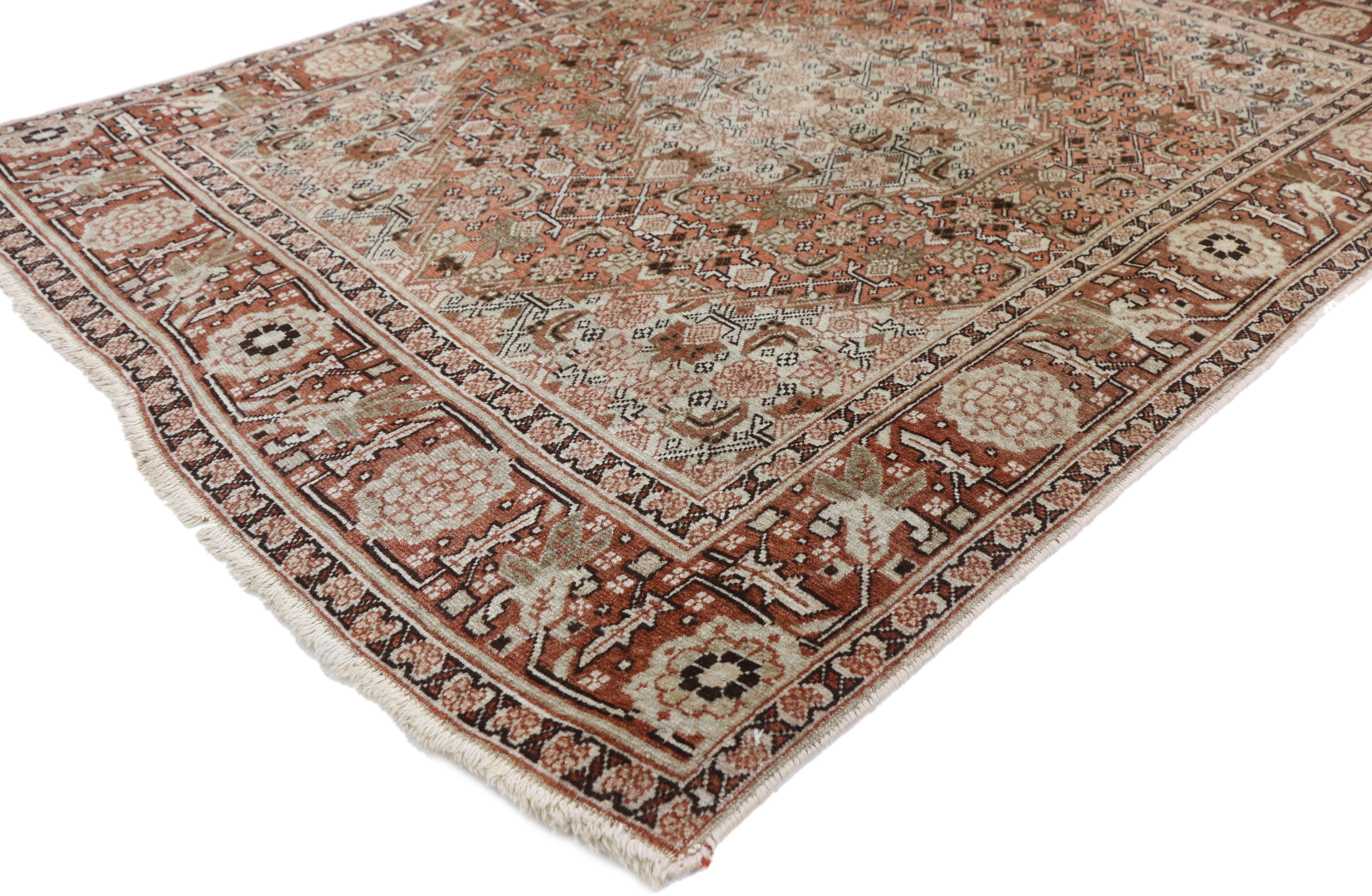 73403, antique Persian Tabriz accent rug, foyer or entry rug with Arts & Crafts style. This hand knotted wool antique Persian Tabriz rug features a serrated hexagonal medallion set against an abrashed field. The medallion, field, and corner