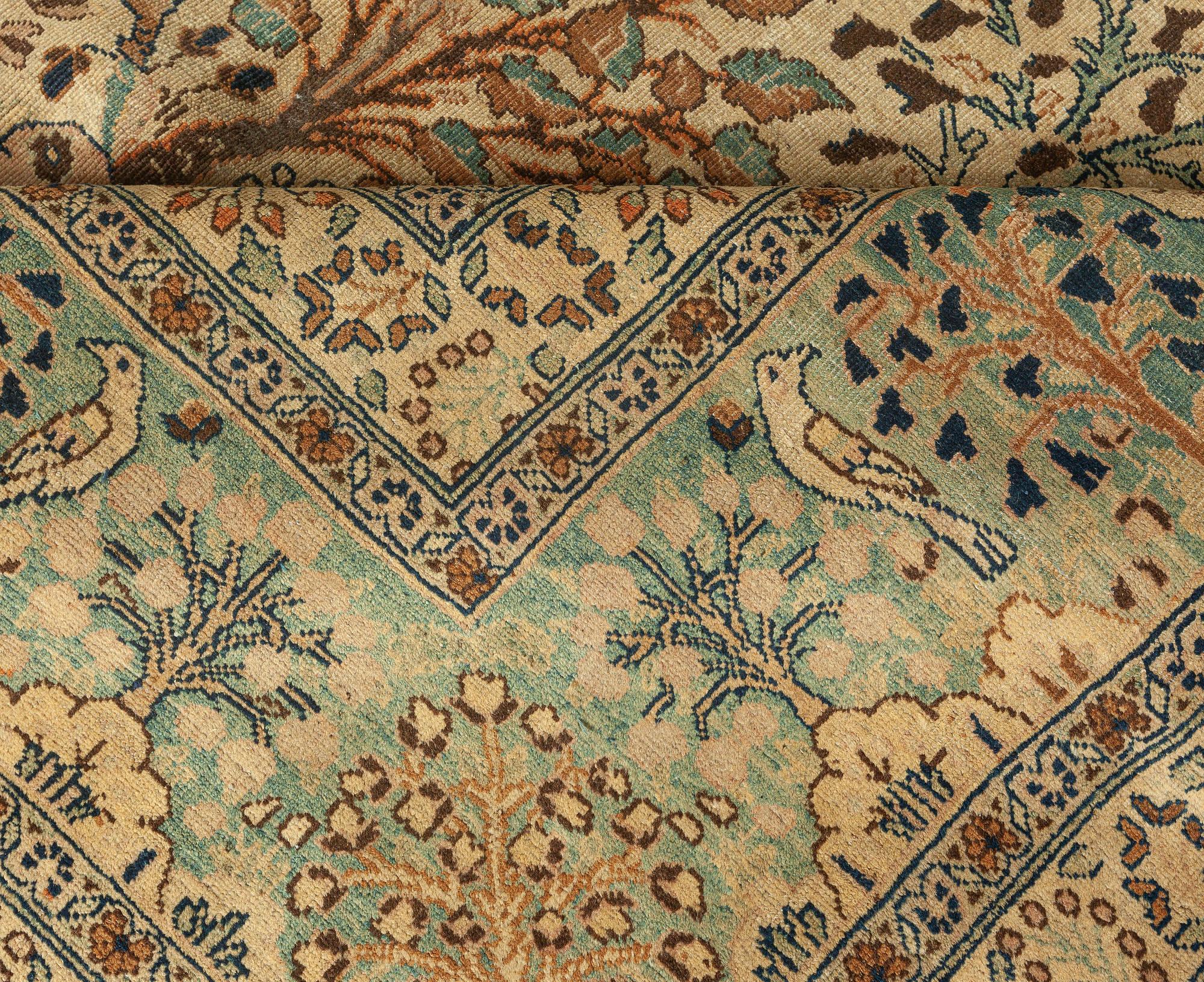 Antique Persian Tabriz animal design carpet
Size: 11'3
