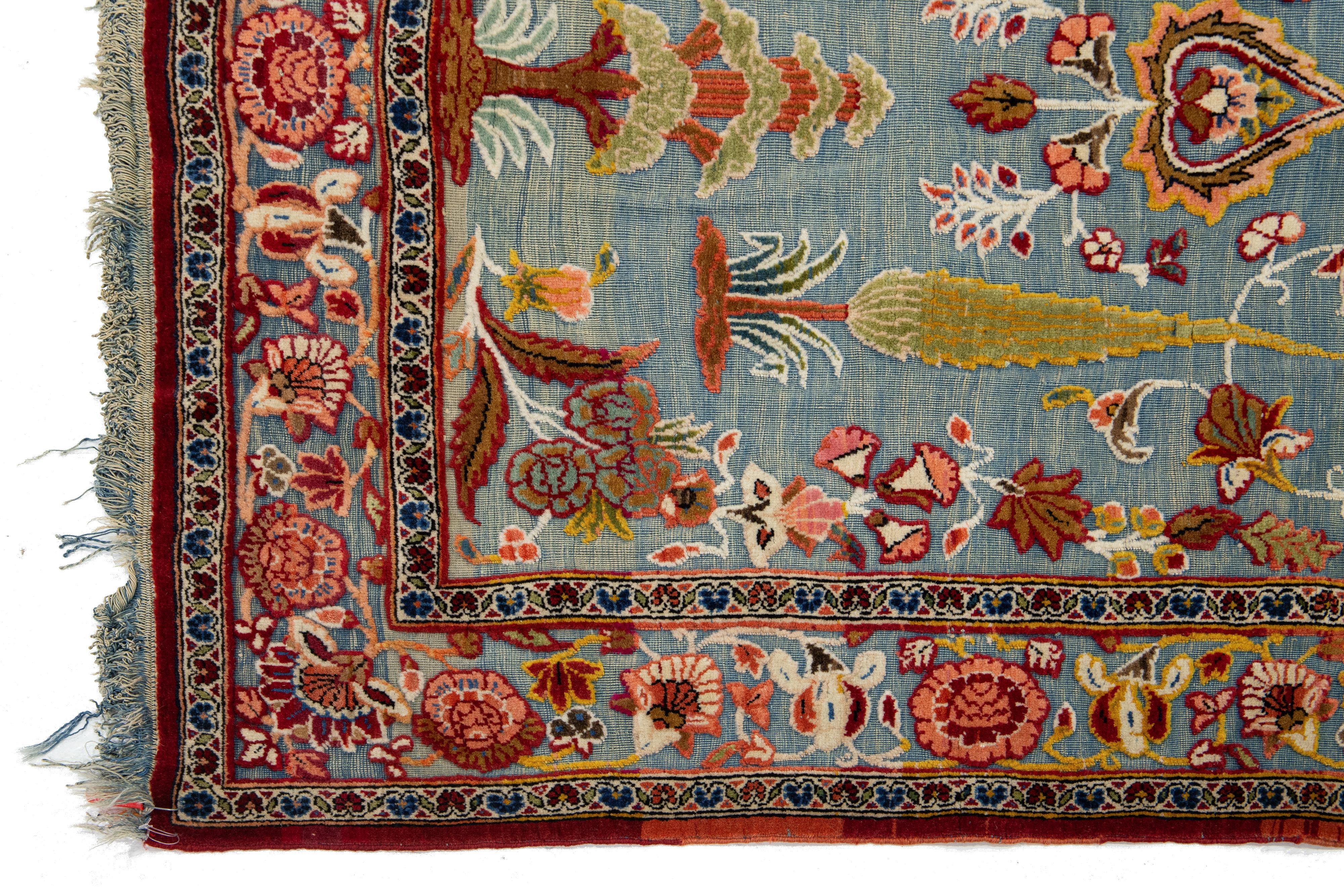 Tapis persan ancien de Tabriz en laine bleue à motifs floraux en vente 1