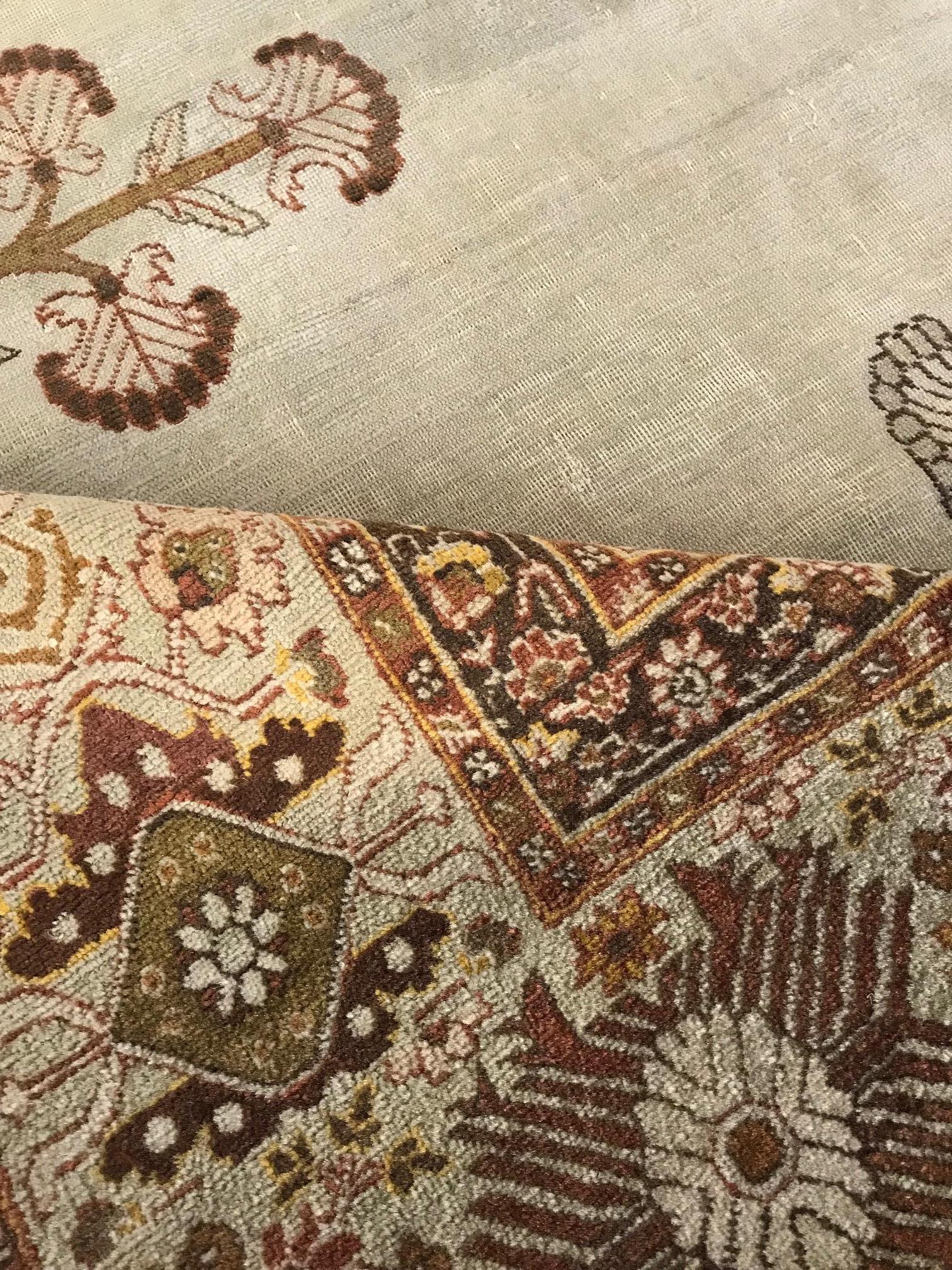 Antique Persian Tabriz handmade wool rug
Size: 9'0