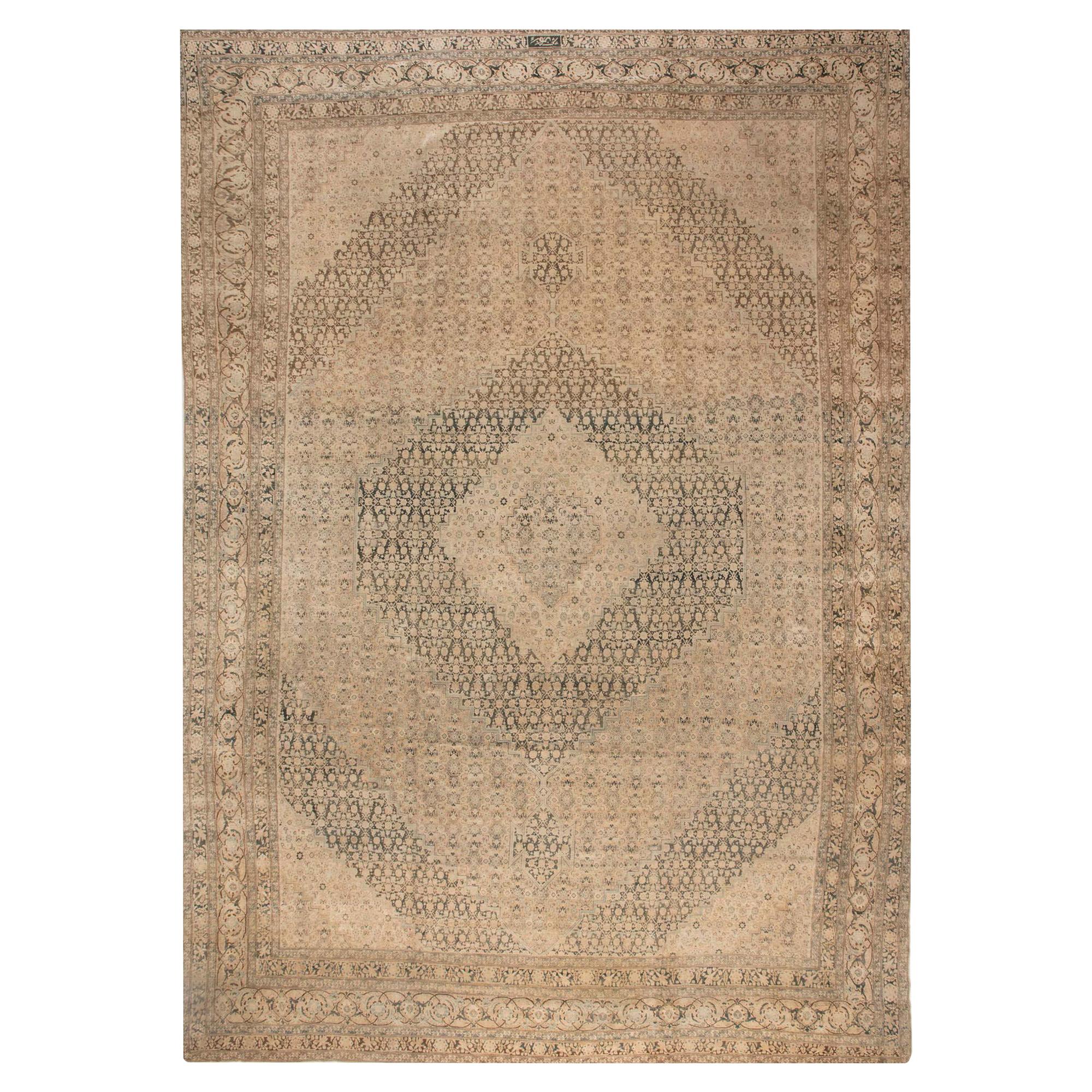 Antique Persian Tabriz Handwoven Wool Carpet For Sale