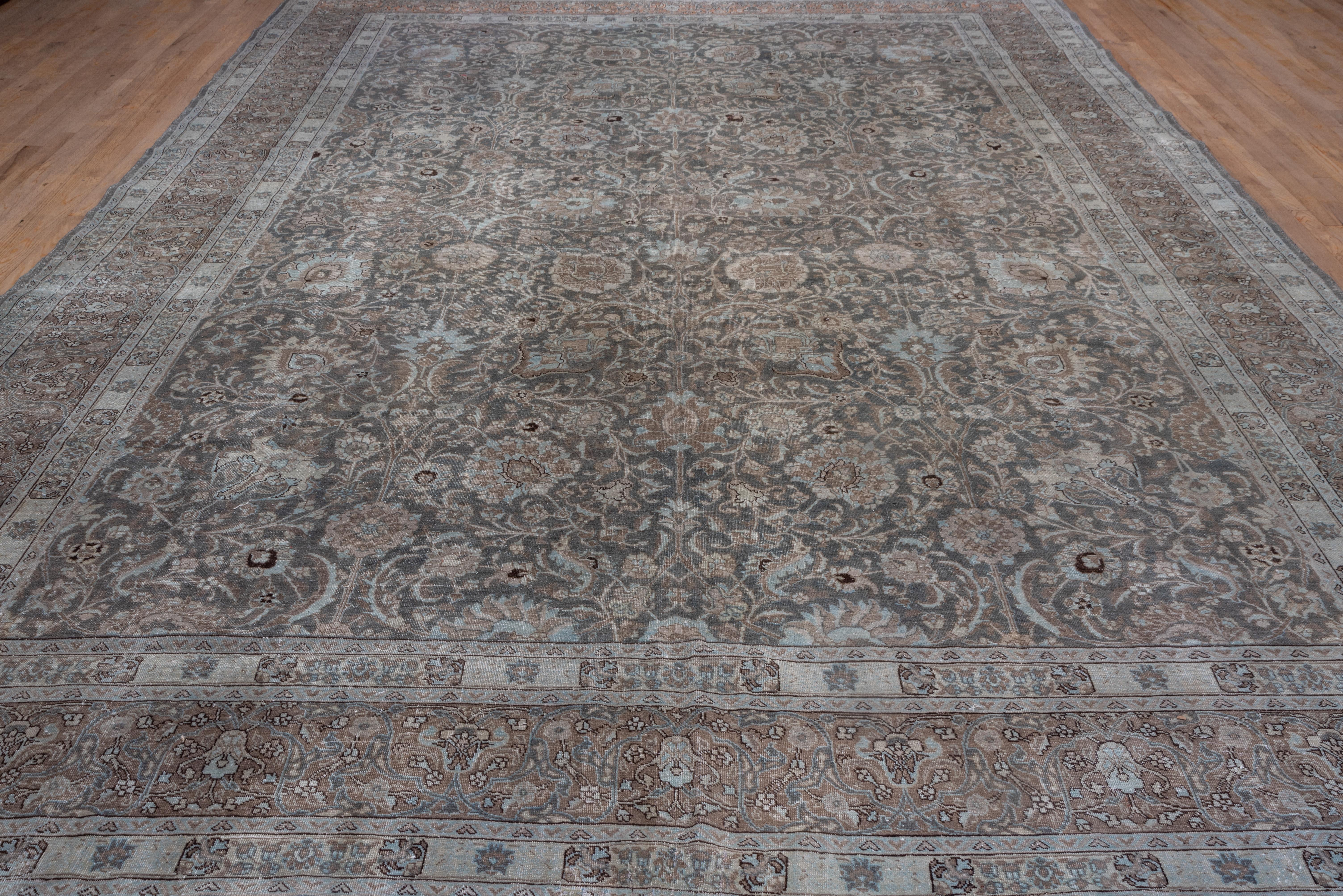 This NW Persian city carpet displays a well-drawn version of the classic 'Vase carpet