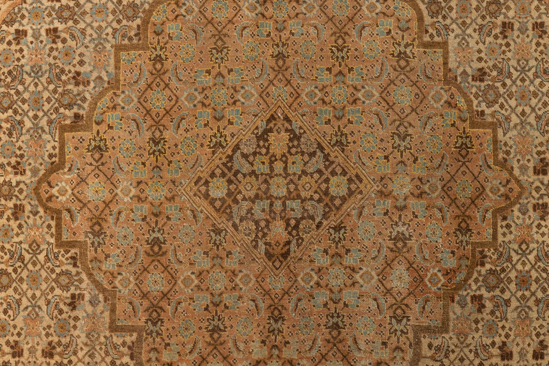 Tabriz – Northwest Persia

This is a Tabriz rug inspired by the master of arts Hadji Jallili. Its design emphasizes subtle gradations of colour hue and precise, detailed work. Rather than the predominant medallion most commonly seen in Persian rugs,