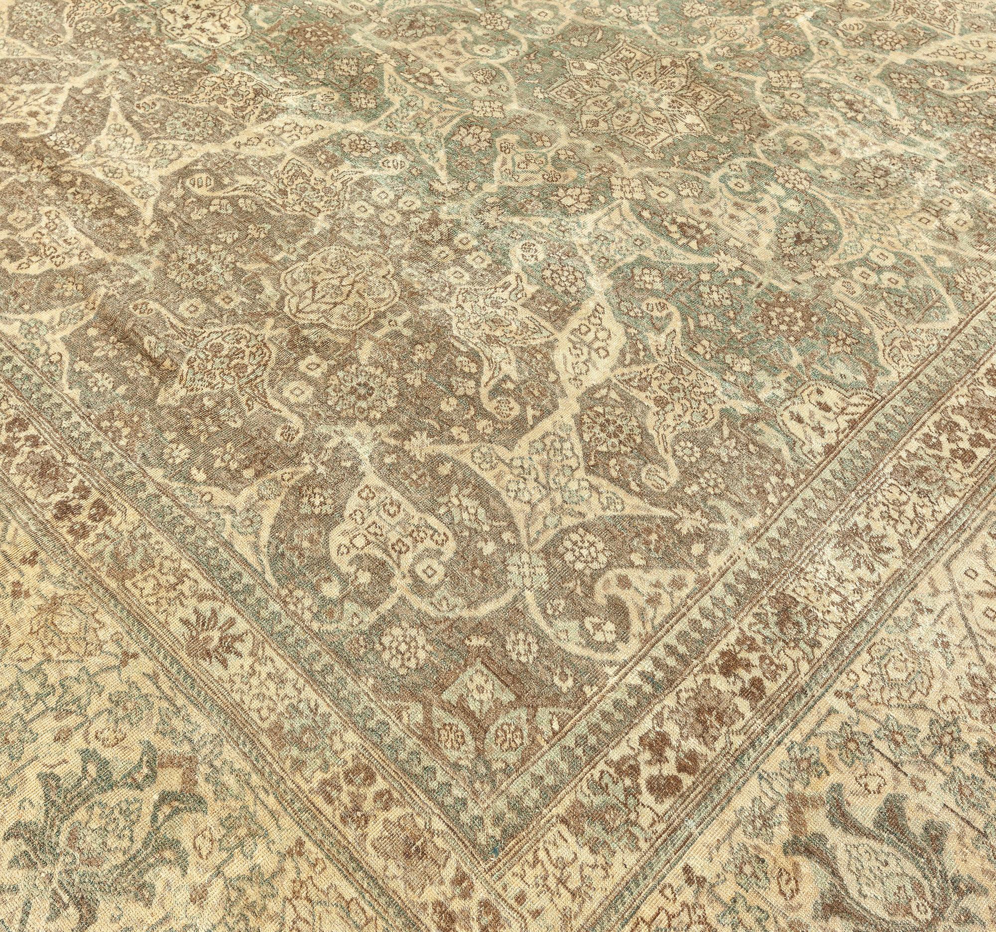 Authentic 19th Century Persian Tabriz botanic carpet
Size: 10'10