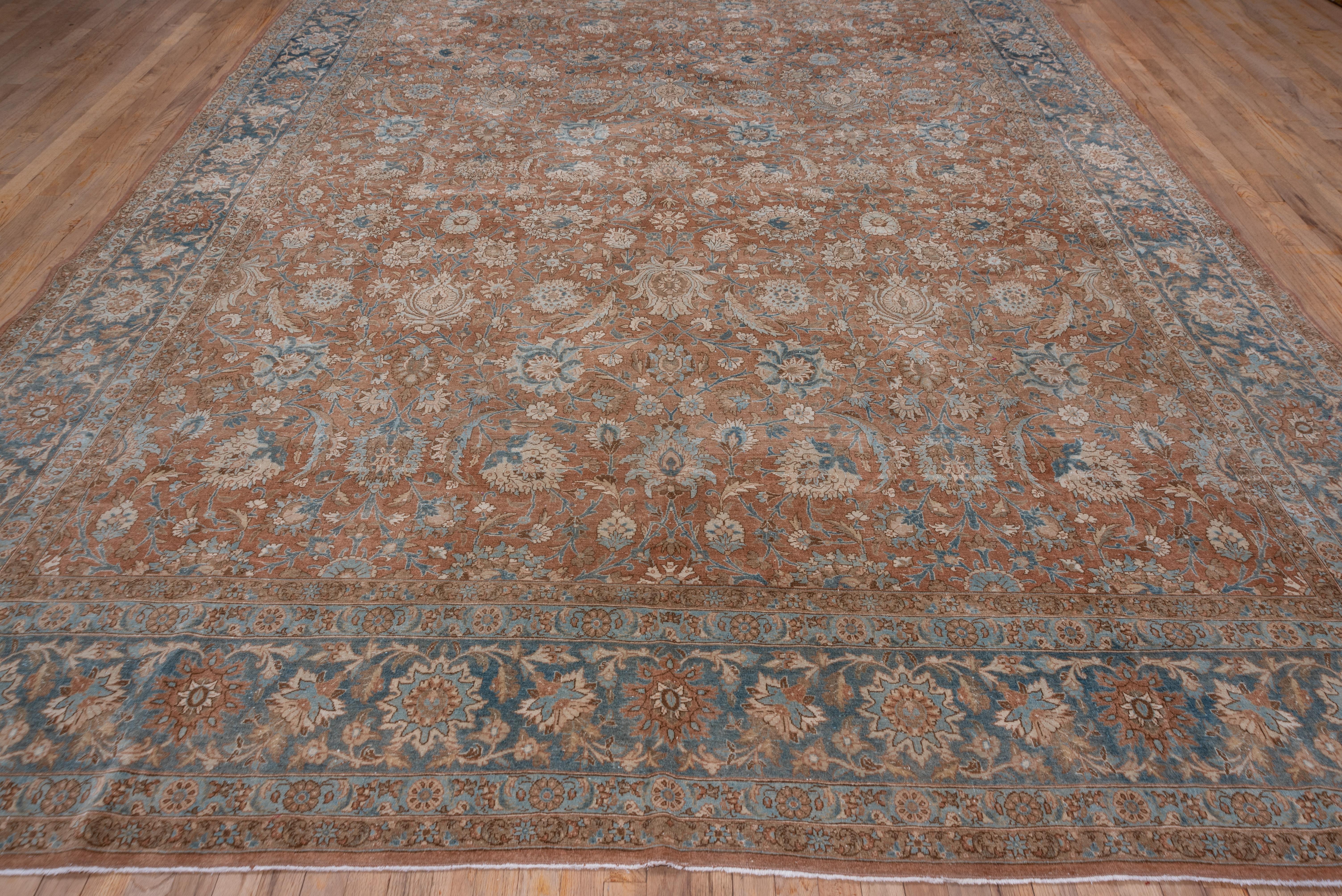 Early 20th Century Antique Persian Tabriz Carpet, Rust Field, All-Over Field, Blue Border For Sale