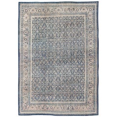 Antico tappeto persiano Tabriz con disegno geometrico Herati nei toni del blu scuro
