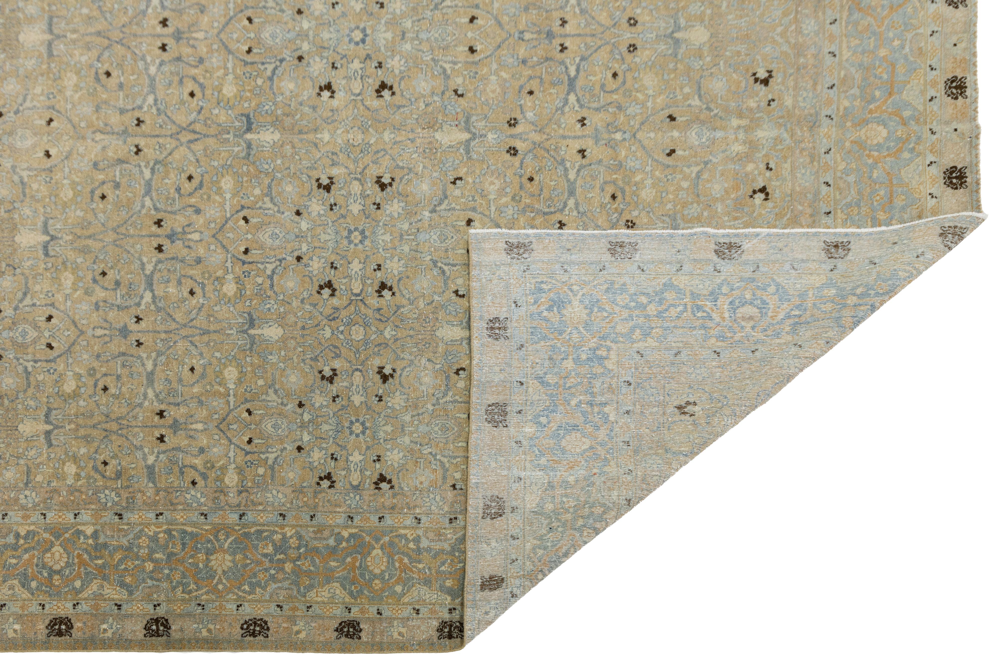 Islamic Antique Persian Tabriz Designed Wool Rug Floral in Muted Tones For Sale