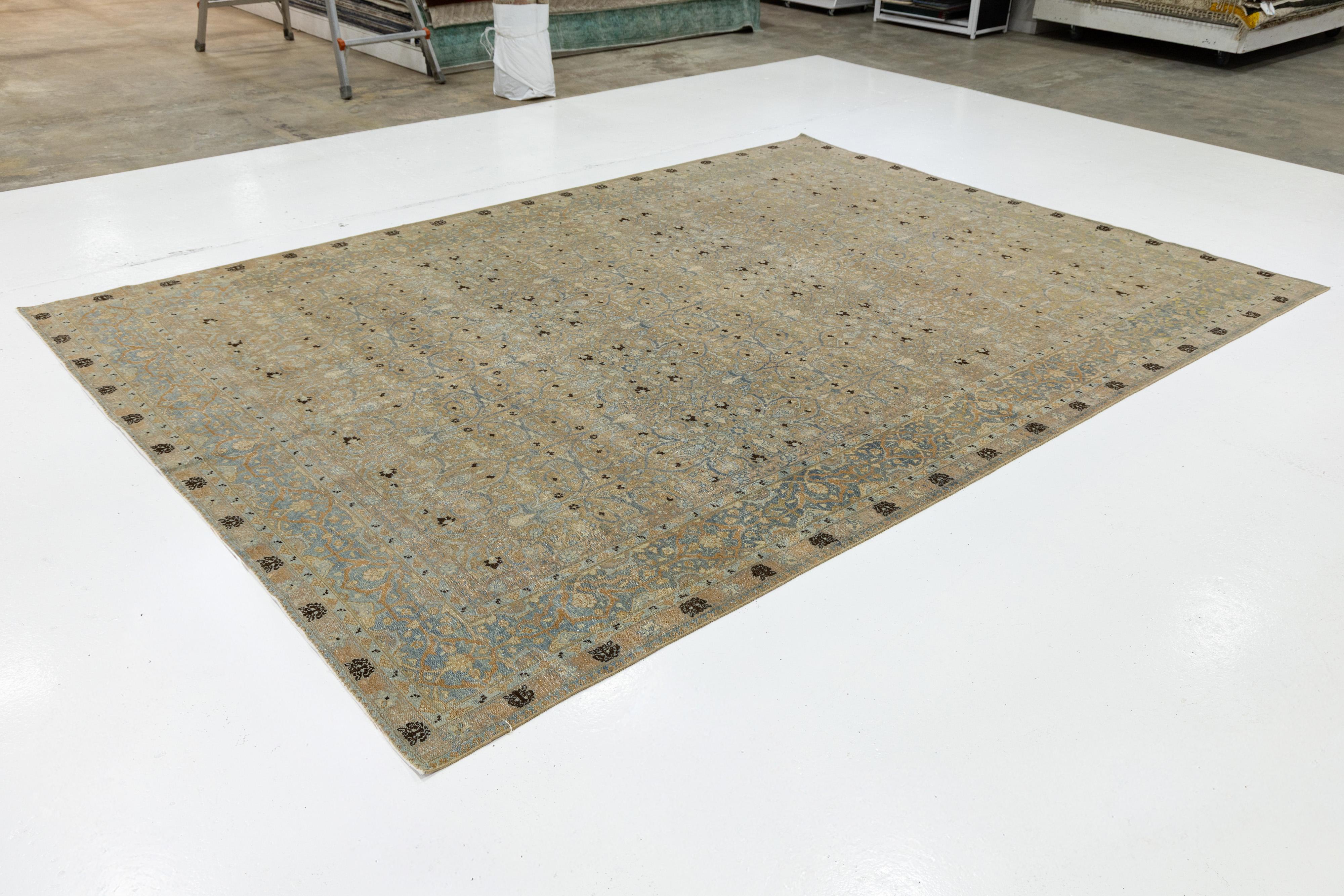 Hand-Knotted Antique Persian Tabriz Designed Wool Rug Floral in Muted Tones For Sale