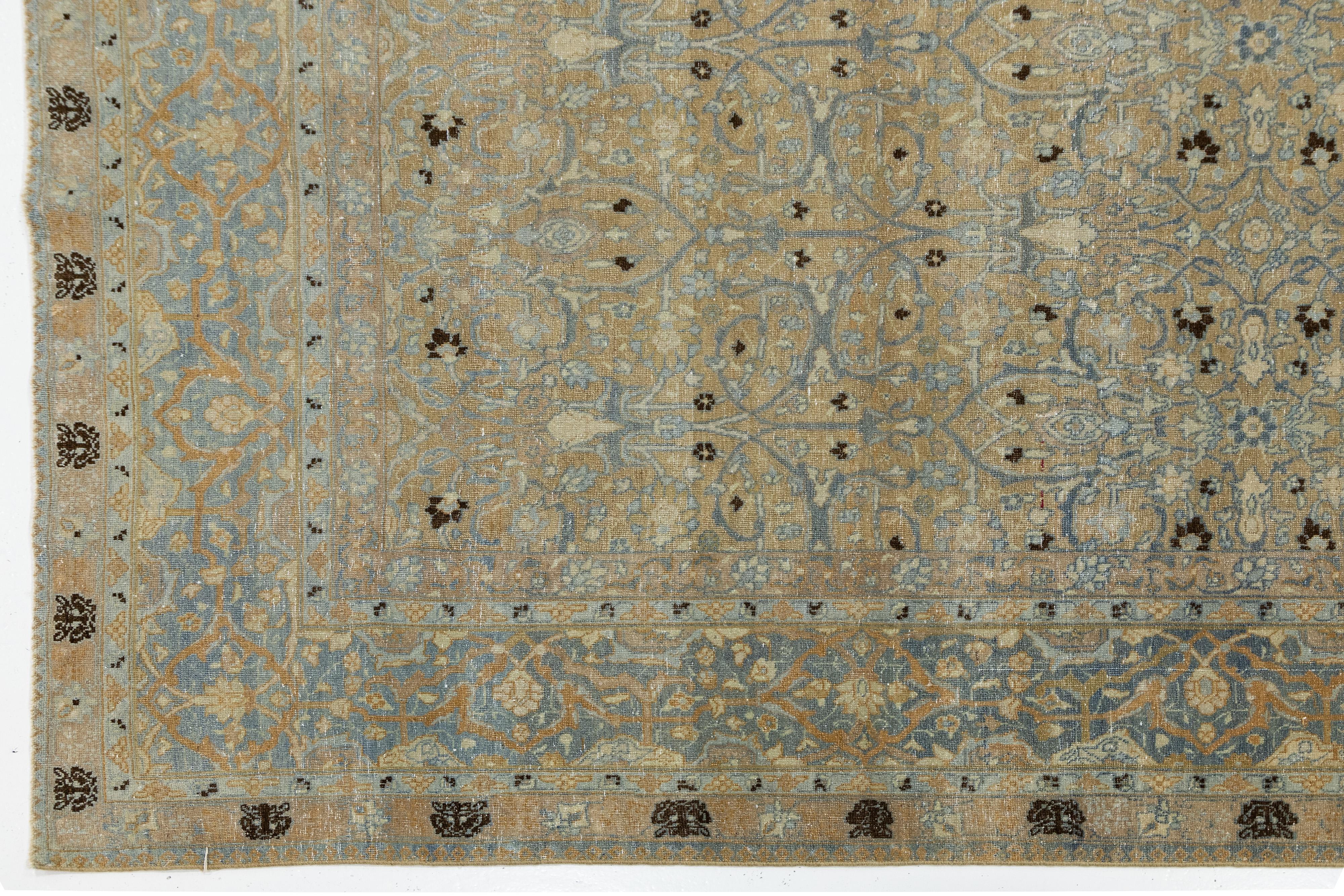 20th Century Antique Persian Tabriz Designed Wool Rug Floral in Muted Tones For Sale