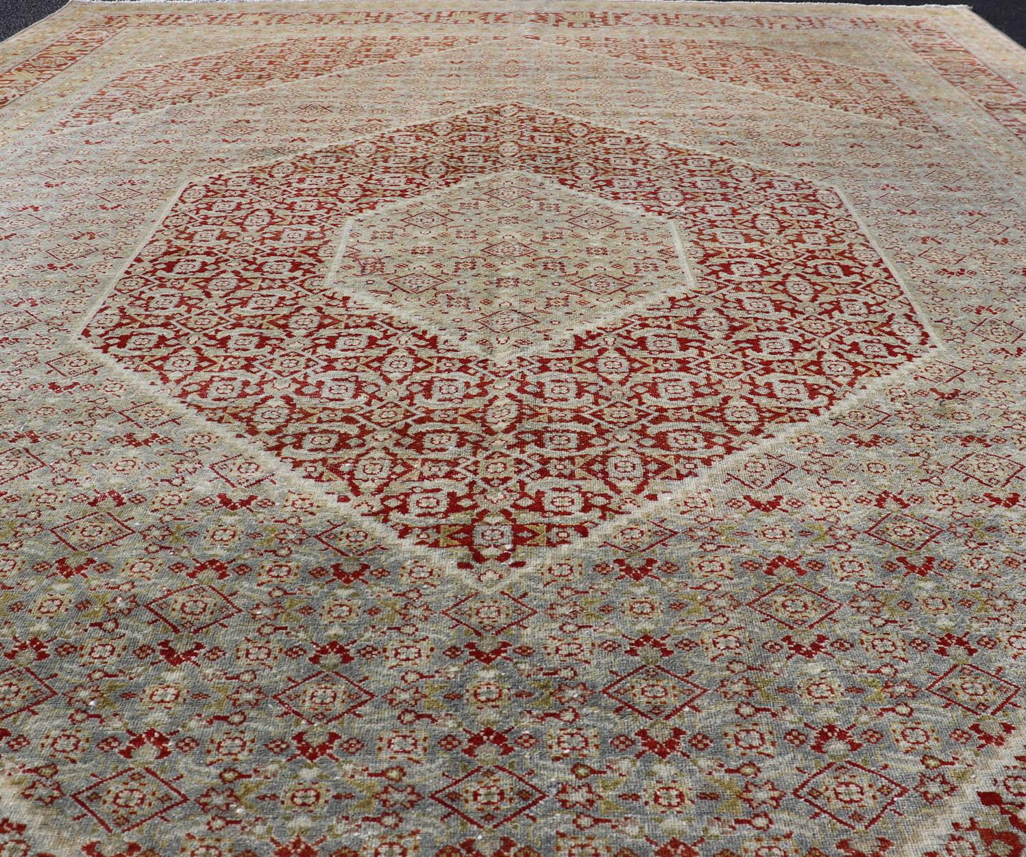 Hand-Knotted Antique Persian Tabriz Distressed Carpet with Geometric Diamond Design For Sale