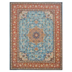 Used Persian Tabriz Emad 9x12 Light Blue, Red, & Ivory Handmade Area Rug