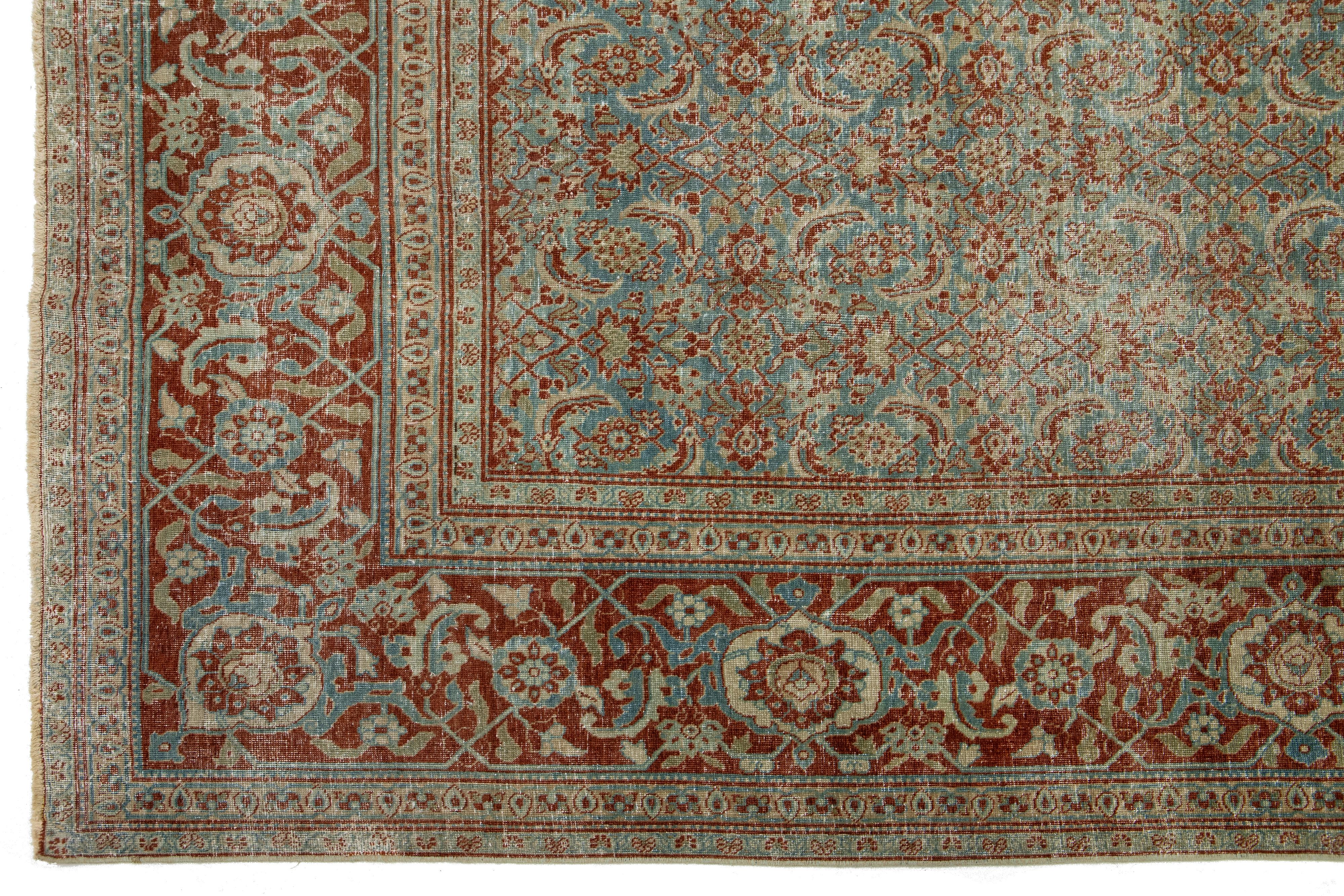 Antiker persischer Täbris-Wollteppich in Blau mit Blumenmuster (Wolle) im Angebot